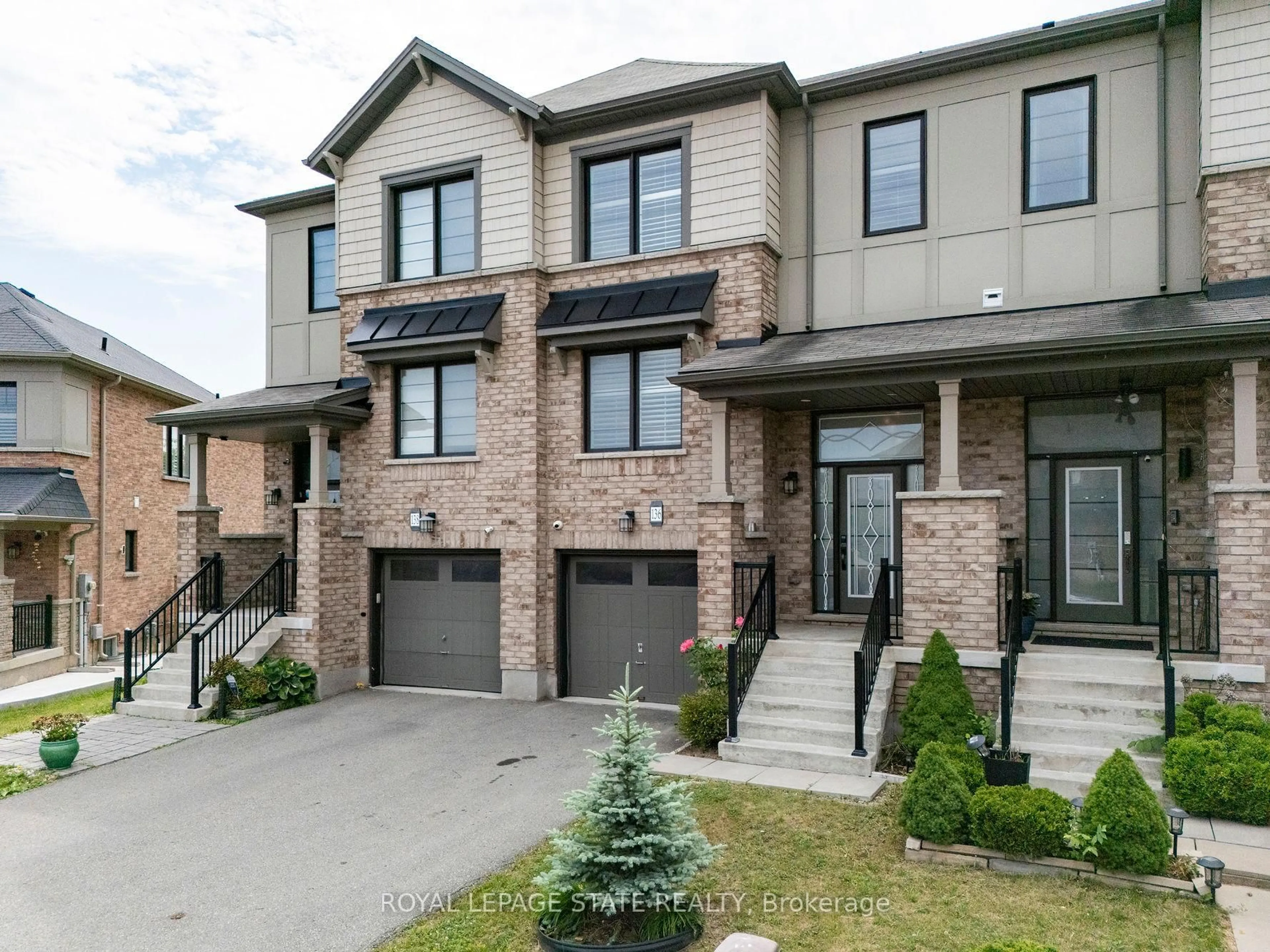 Home with brick exterior material, street for 136 Crafter Cres, Hamilton Ontario L8J 0H8