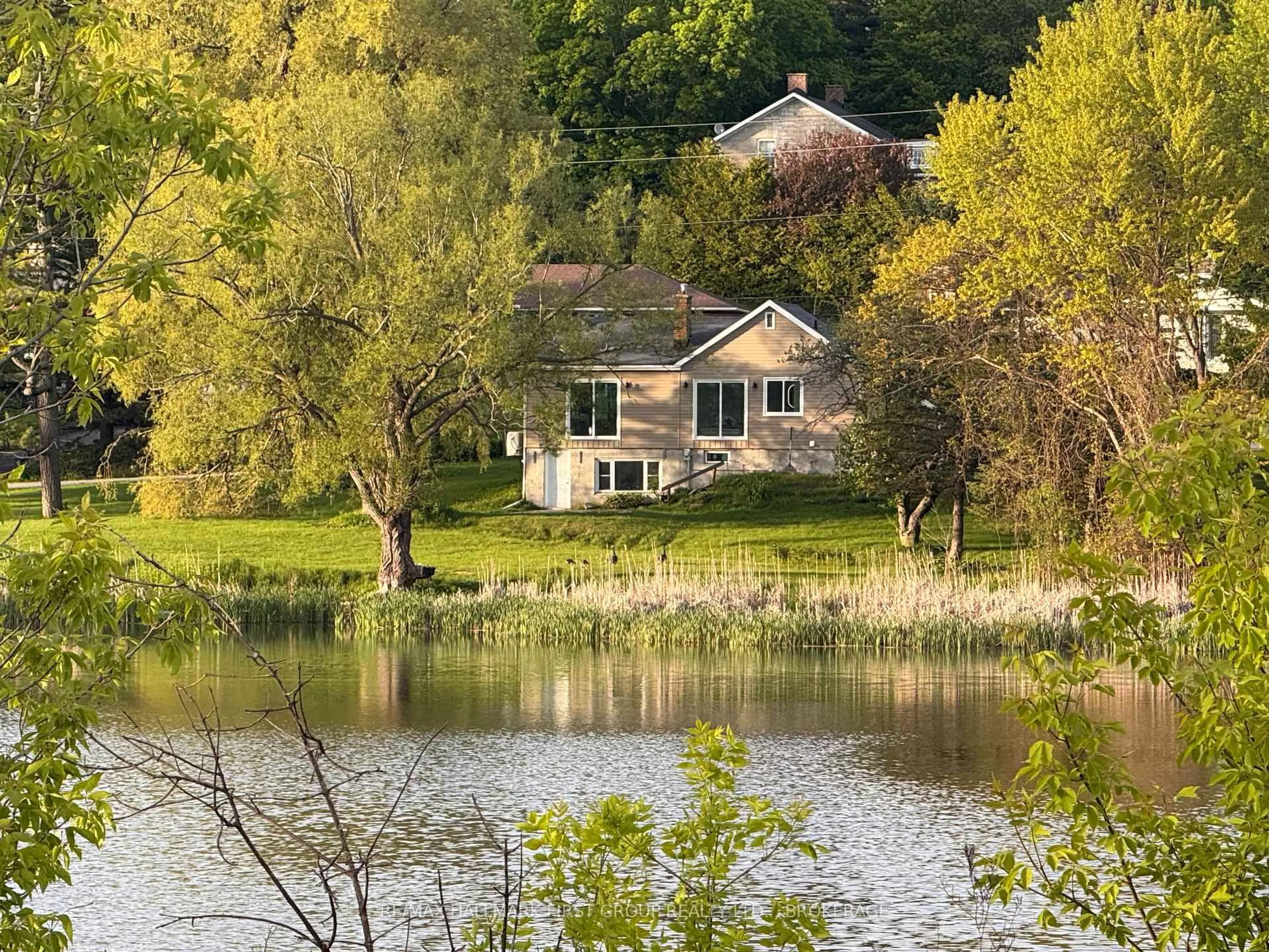 A pic from outside/outdoor area/front of a property/back of a property/a pic from drone, water/lake/river/ocean view for 757 Hillview Rd, Kingston Ontario K7M 5C8