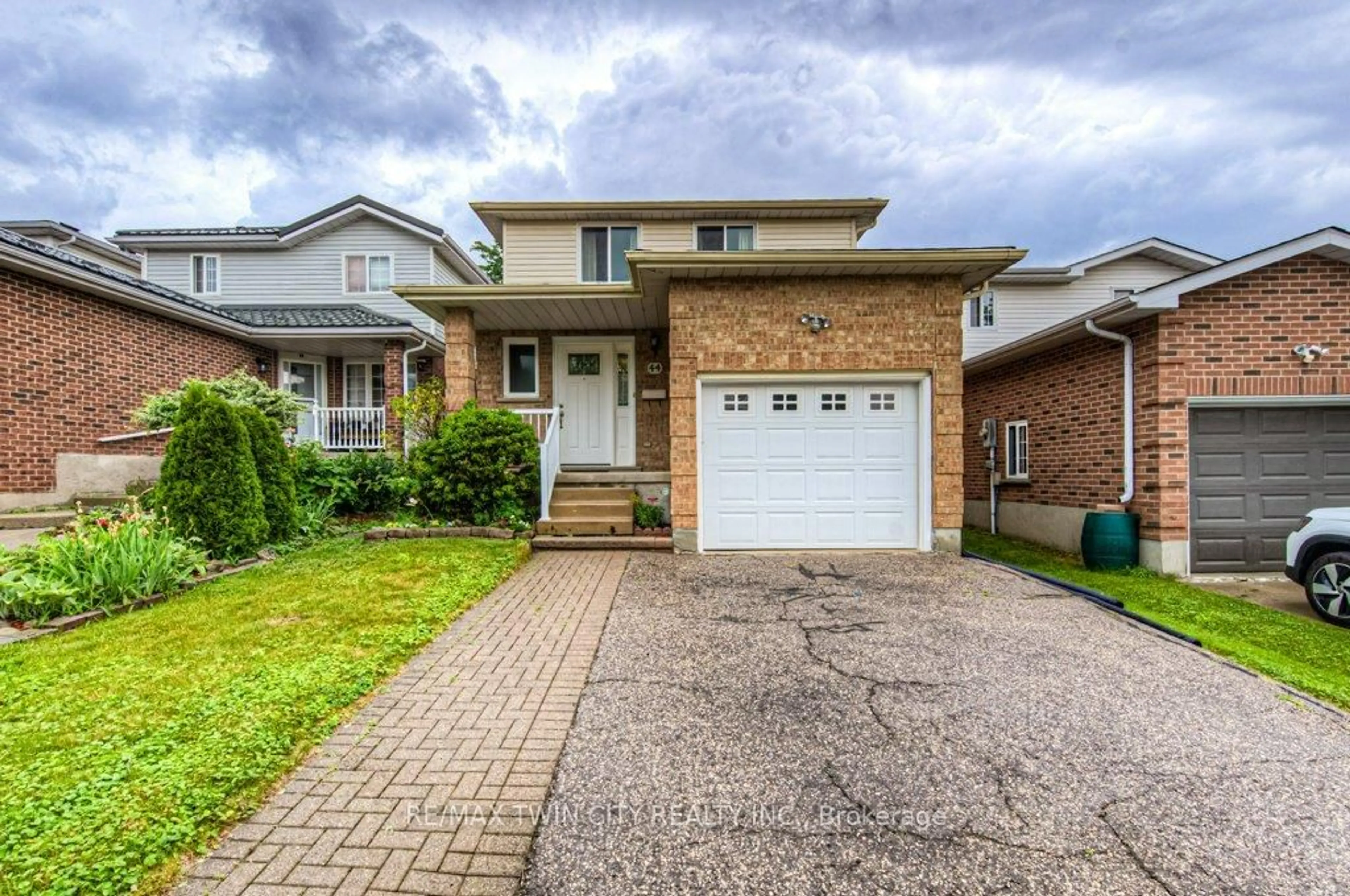Home with brick exterior material, street for 44 Northmanor Cres, Kitchener Ontario N2N 3C2