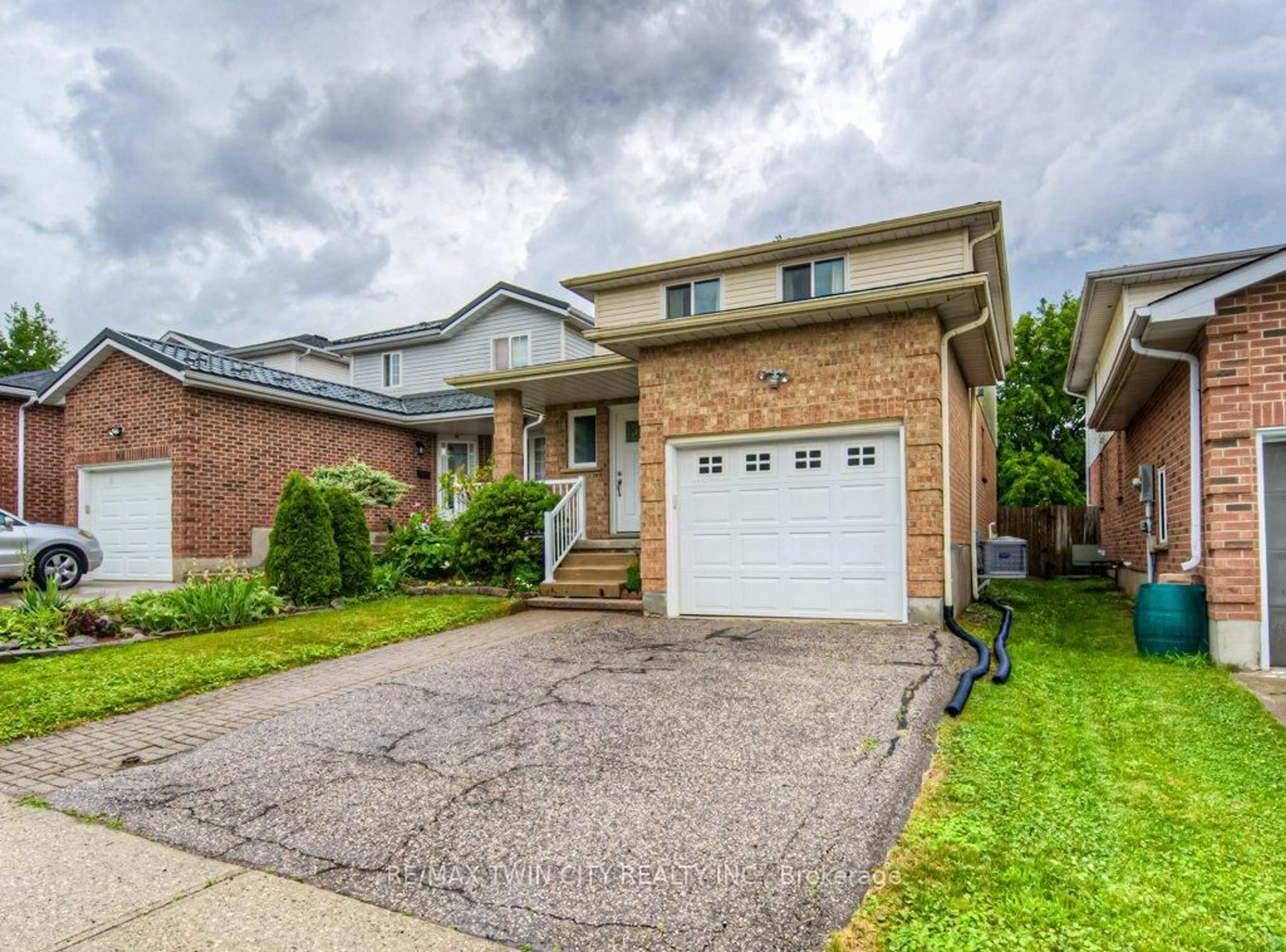 Home with brick exterior material, street for 44 Northmanor Cres, Kitchener Ontario N2N 3C2