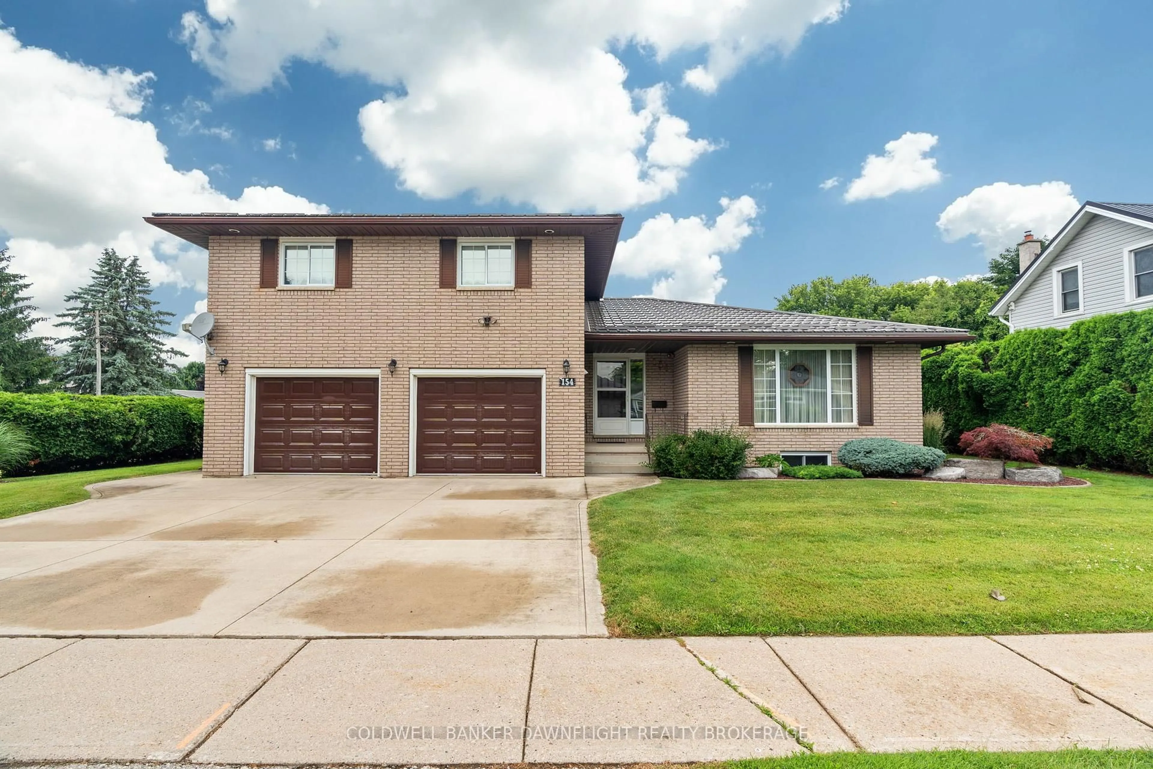 Home with vinyl exterior material, street for 154 Gidley St, South Huron Ontario N0M 1S2