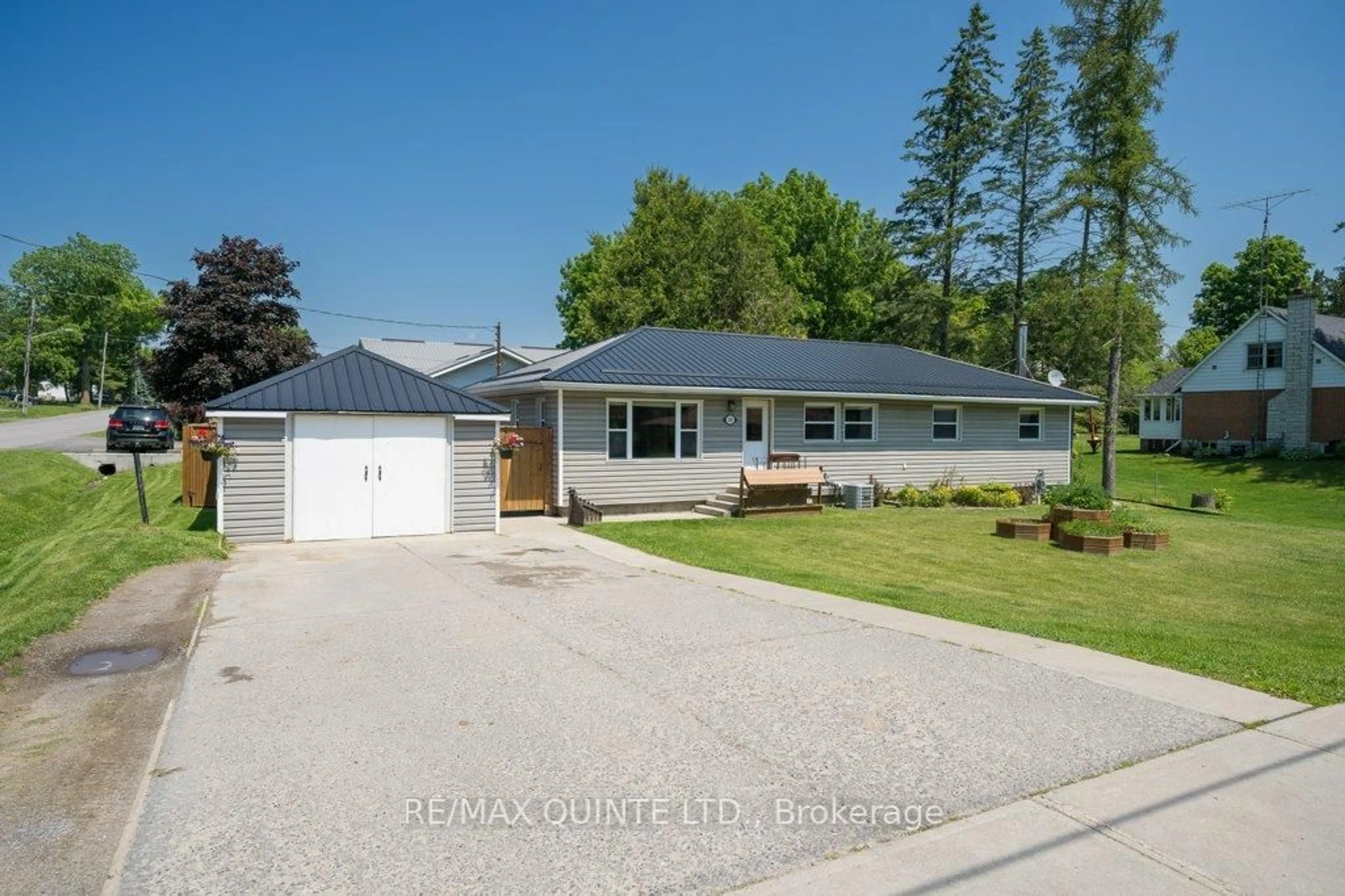 A pic from outside/outdoor area/front of a property/back of a property/a pic from drone, street for 348 River St, Tweed Ontario K0K 3J0