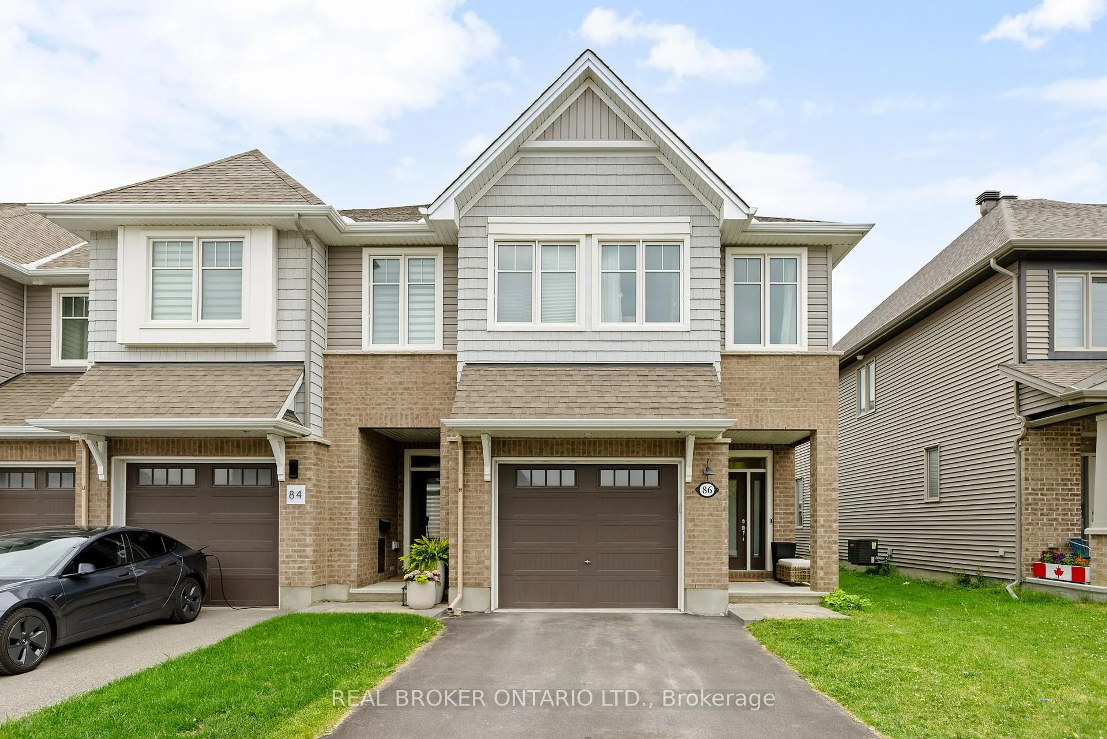 Home with brick exterior material, street for 86 Nepeta Cres, Ottawa Ontario K1T 0S6
