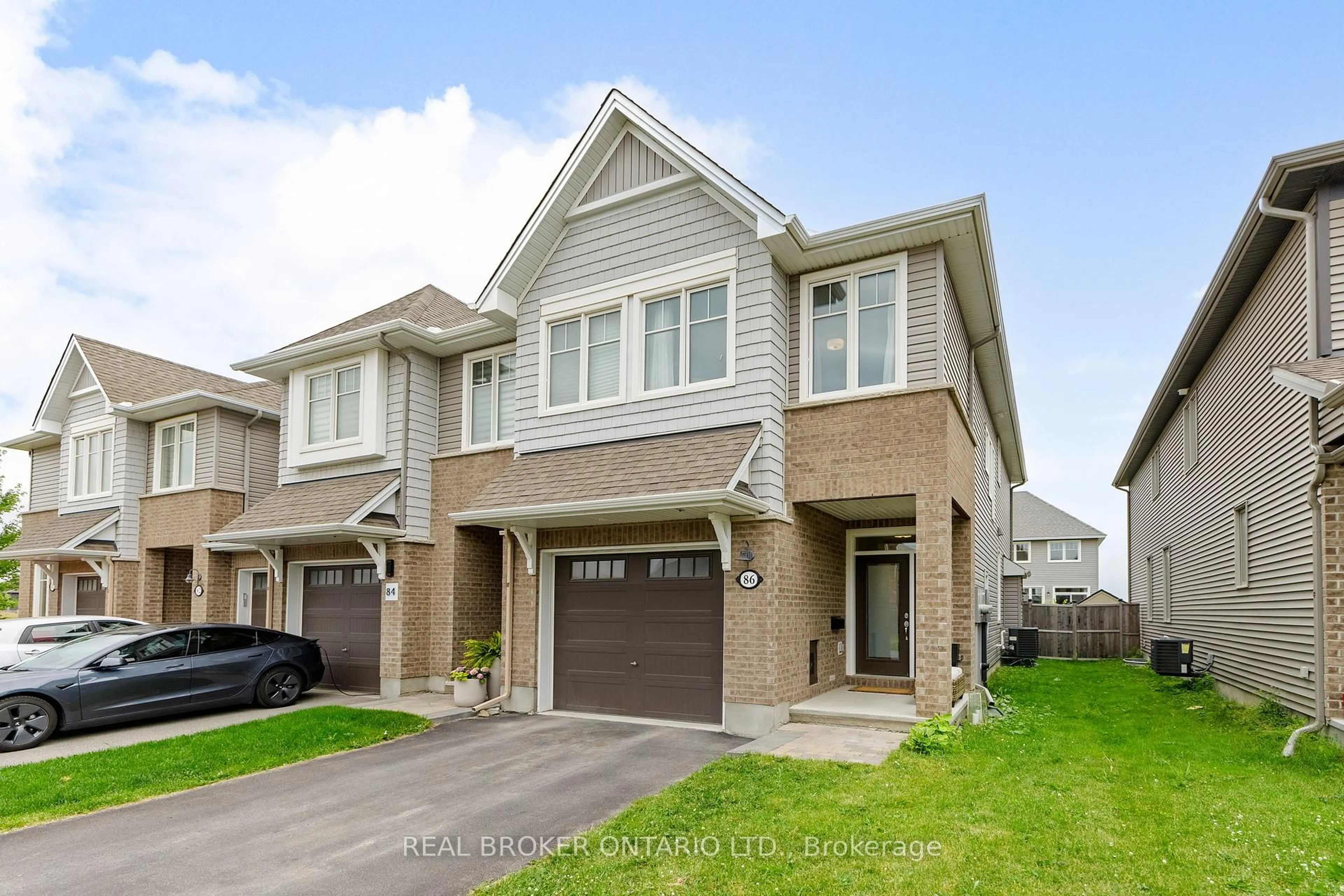 Home with brick exterior material, street for 86 Nepeta Cres, Ottawa Ontario K1T 0S6