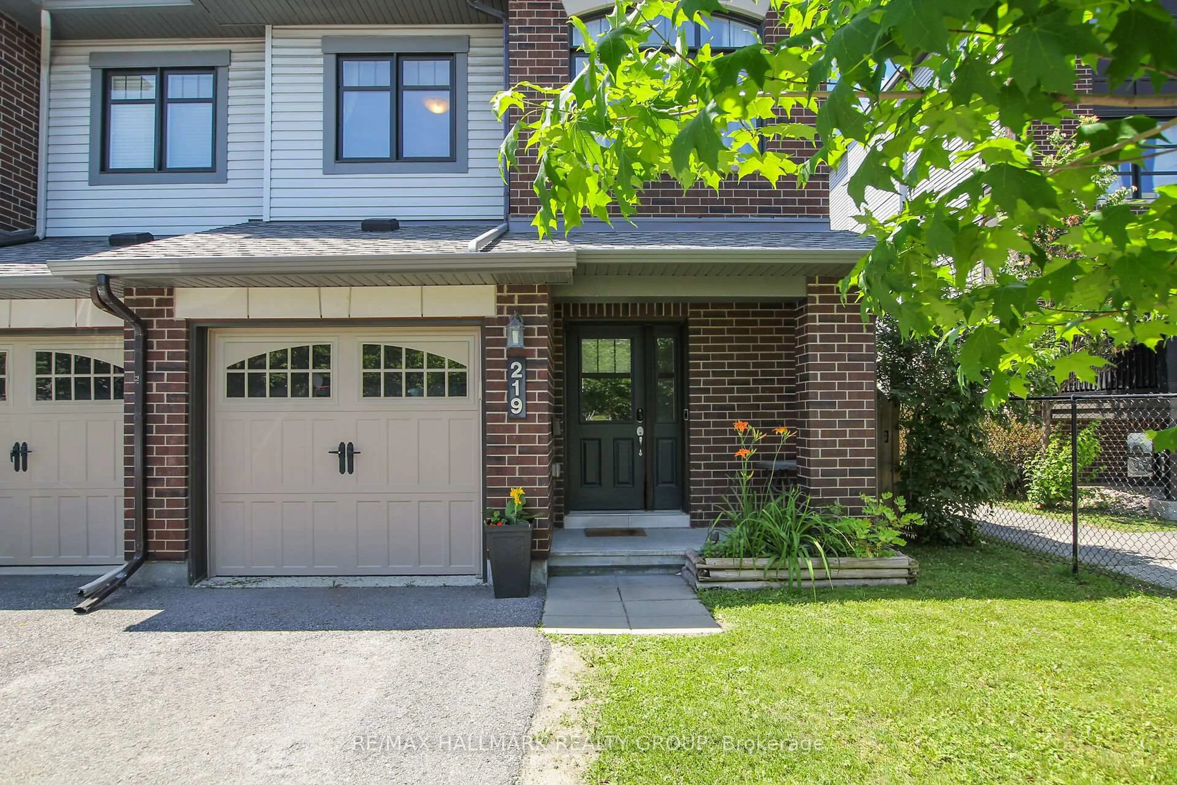 Home with brick exterior material, street for 219 Mancini Way, Ottawa Ontario K2J 5X5