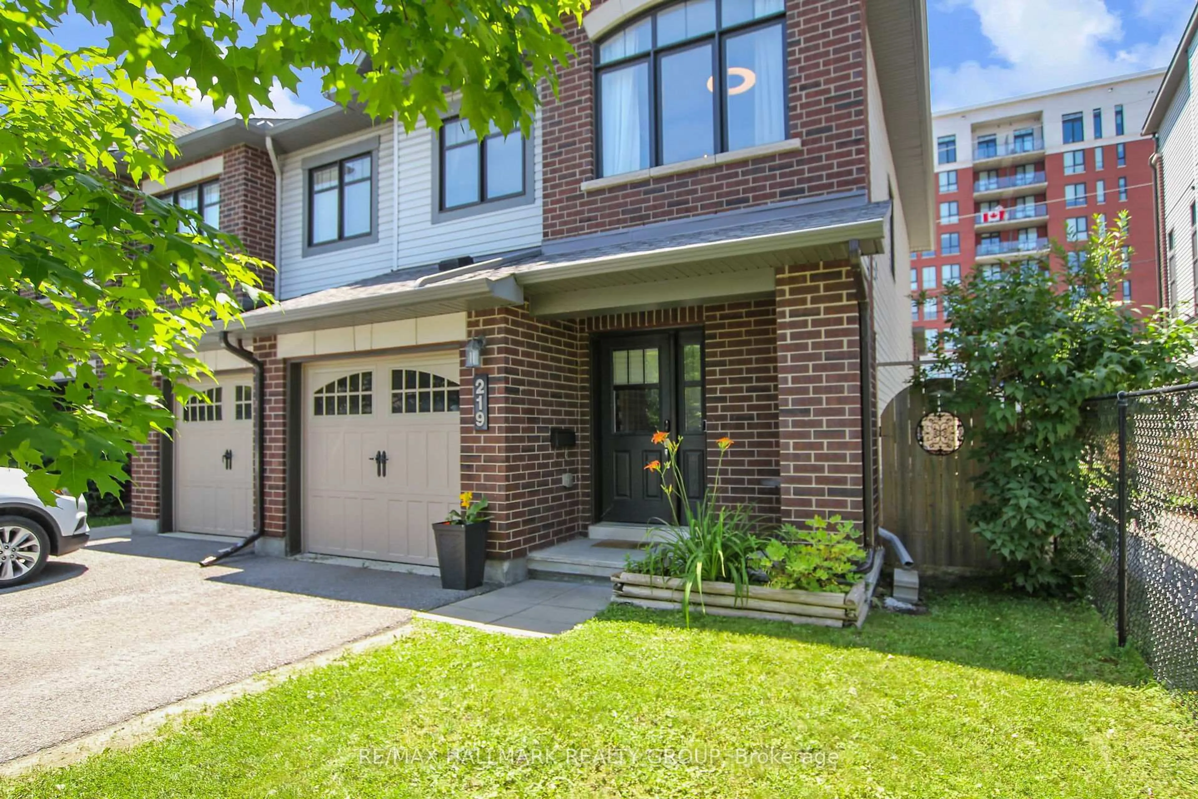 Home with brick exterior material, street for 219 Mancini Way, Ottawa Ontario K2J 5X5