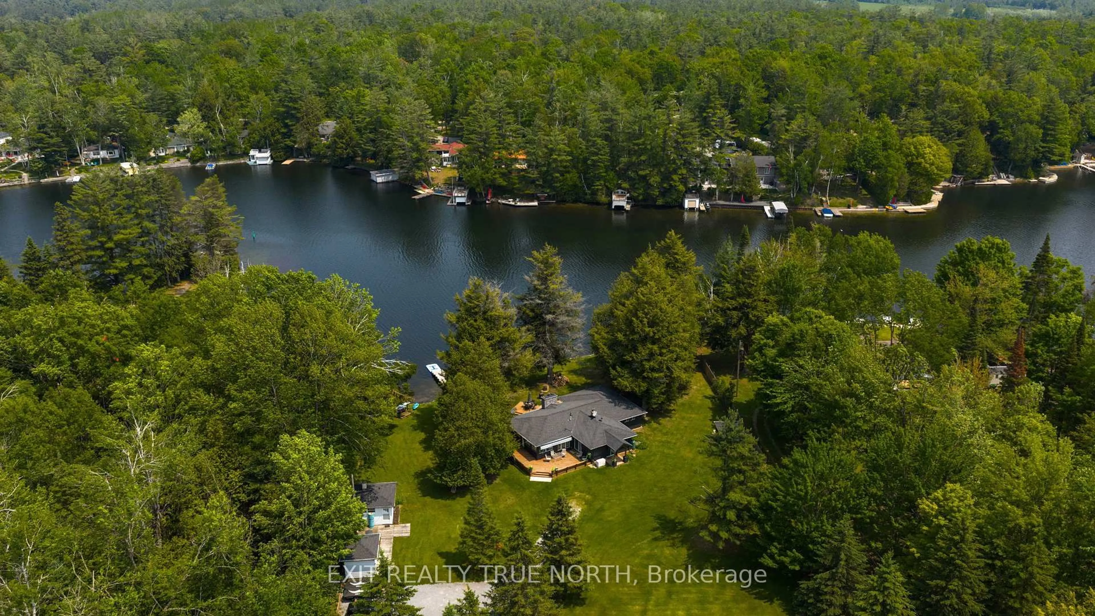 A pic from outside/outdoor area/front of a property/back of a property/a pic from drone, water/lake/river/ocean view for 22 Cardinal Dr, Kawartha Lakes Ontario K0M 2T0
