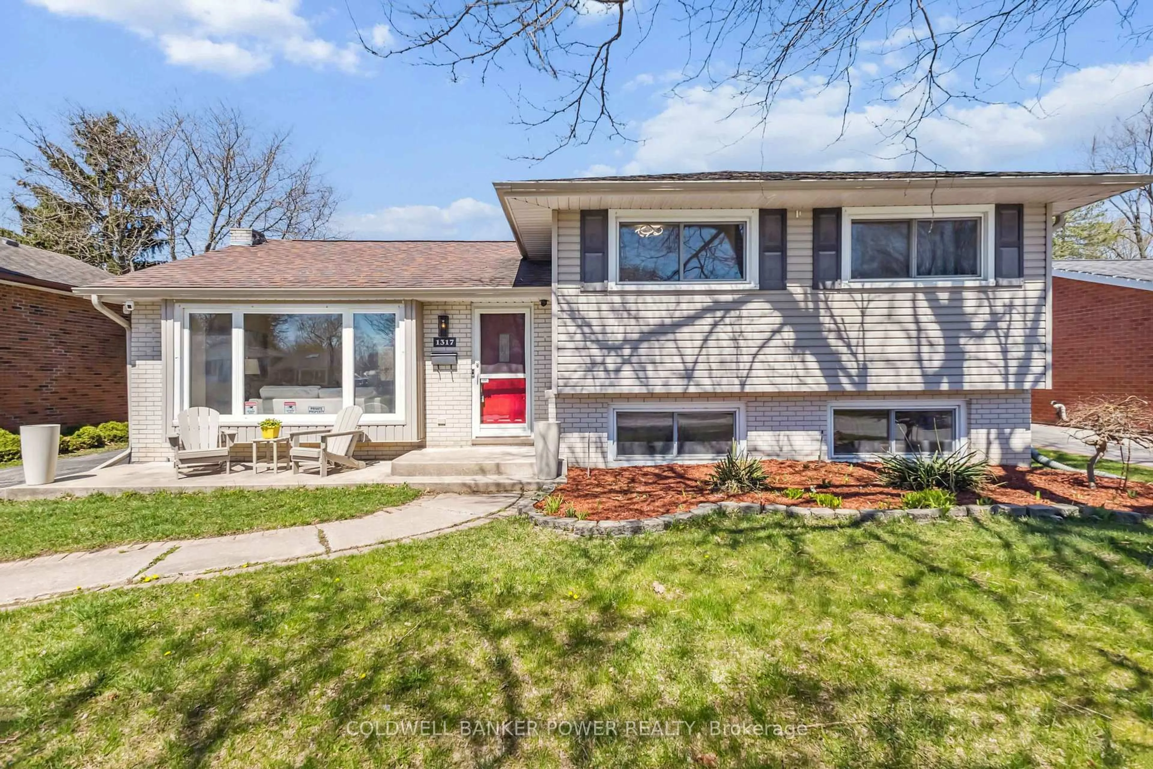 Home with vinyl exterior material, street for 1317 Glenora Dr, London North Ontario N5X 1T6