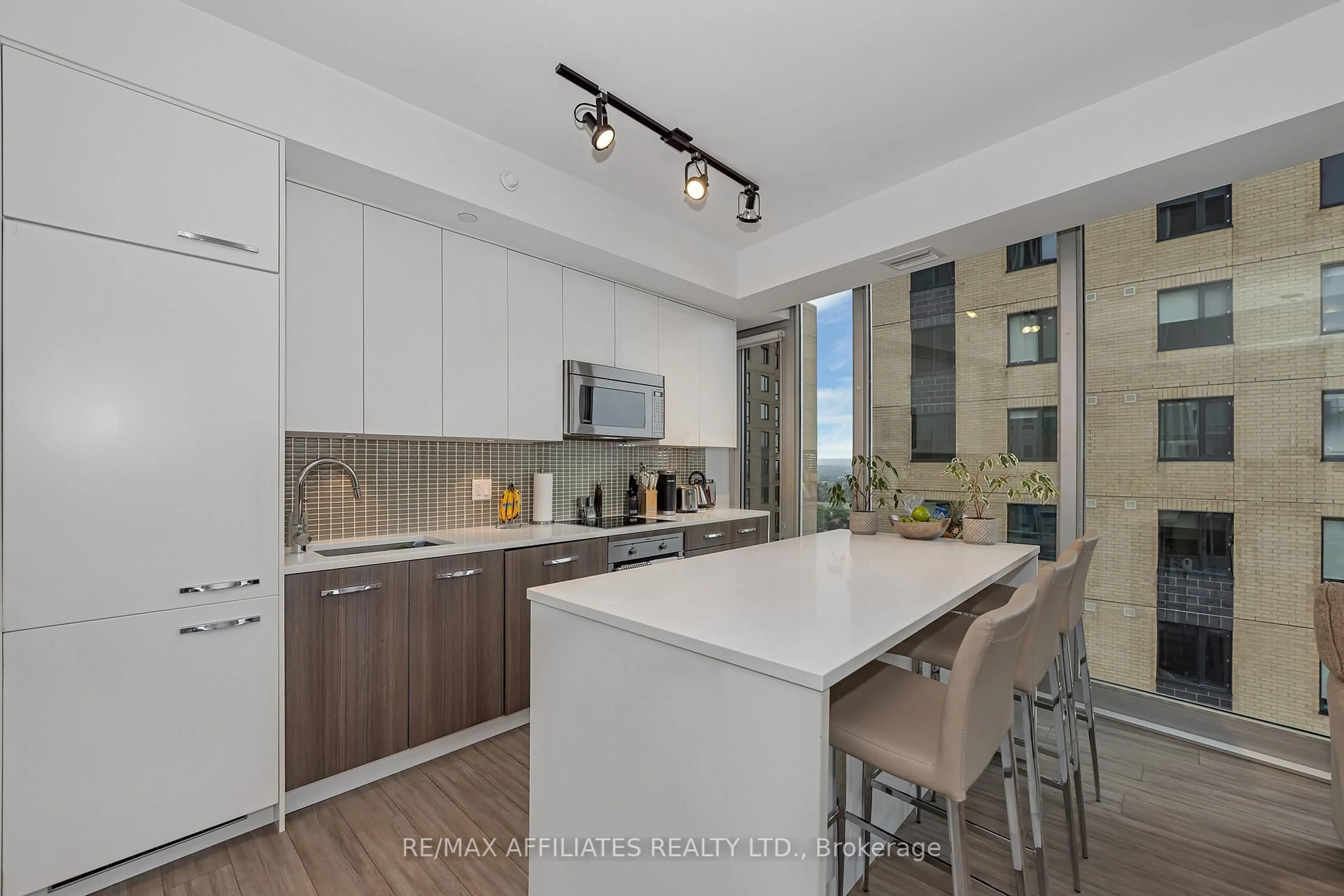 Open concept kitchen, ceramic/tile floor for 111 Champagne Ave #1807, Ottawa Ontario K1S 5V3