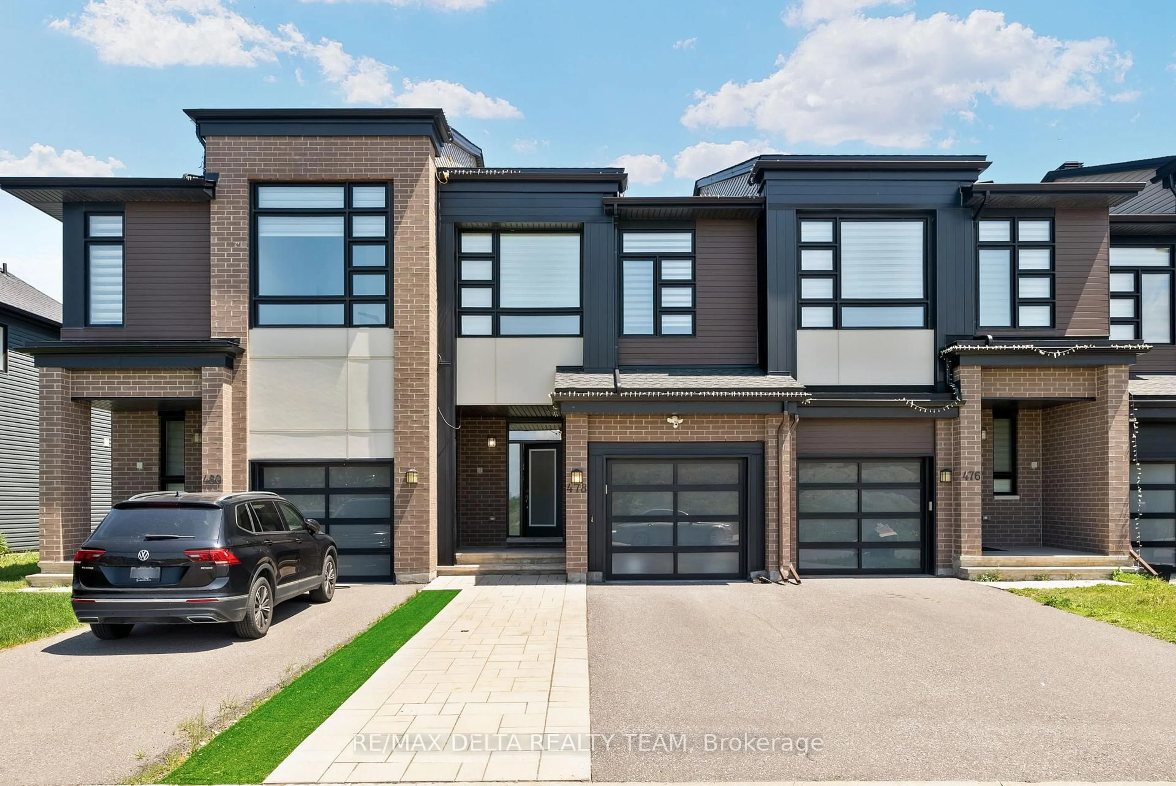 Home with brick exterior material, street for 478 Trident Mews, Ottawa Ontario K1T 0T2