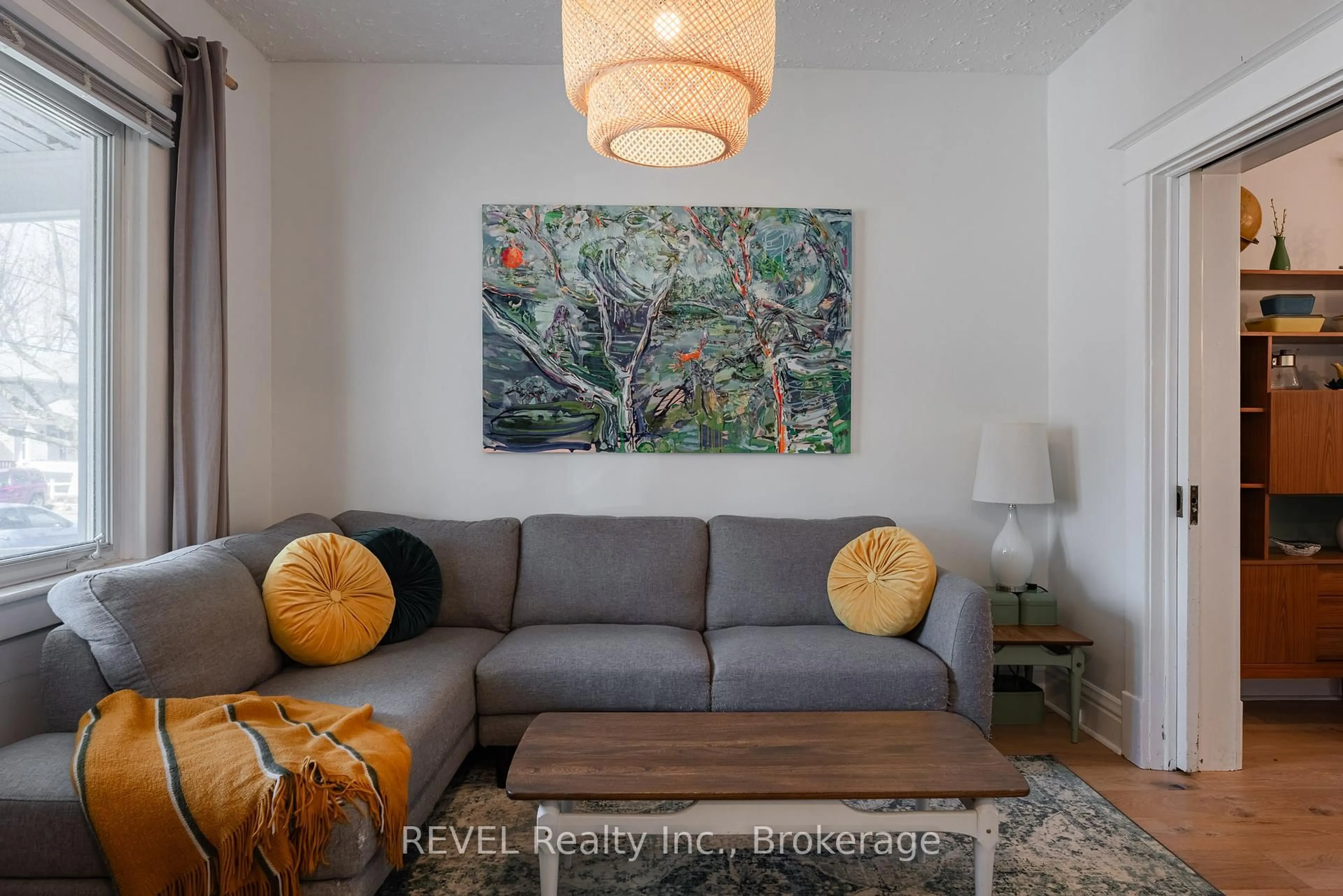 Living room with furniture, unknown for 48 1/2 Wellington St, St. Catharines Ontario L2R 5R1