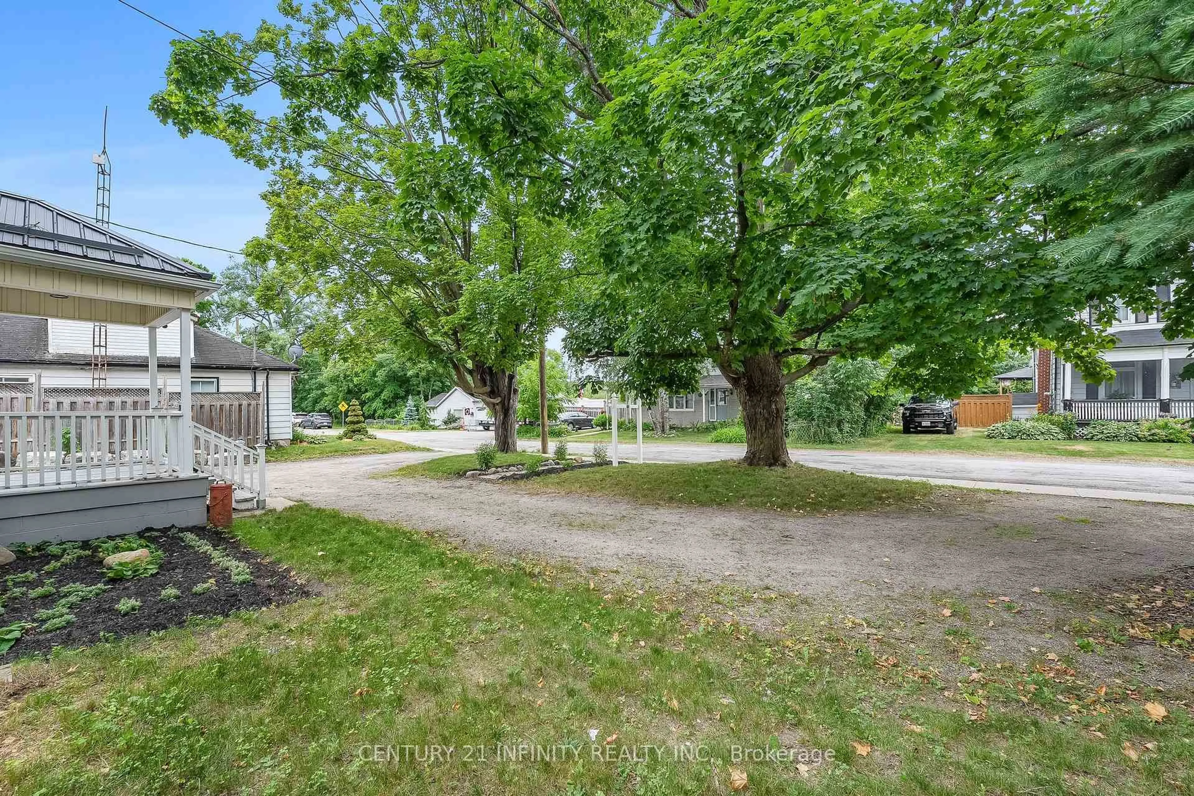 A pic from outside/outdoor area/front of a property/back of a property/a pic from drone, street for 128 Glengarry Rd, Kawartha Lakes Ontario L0A 1A0