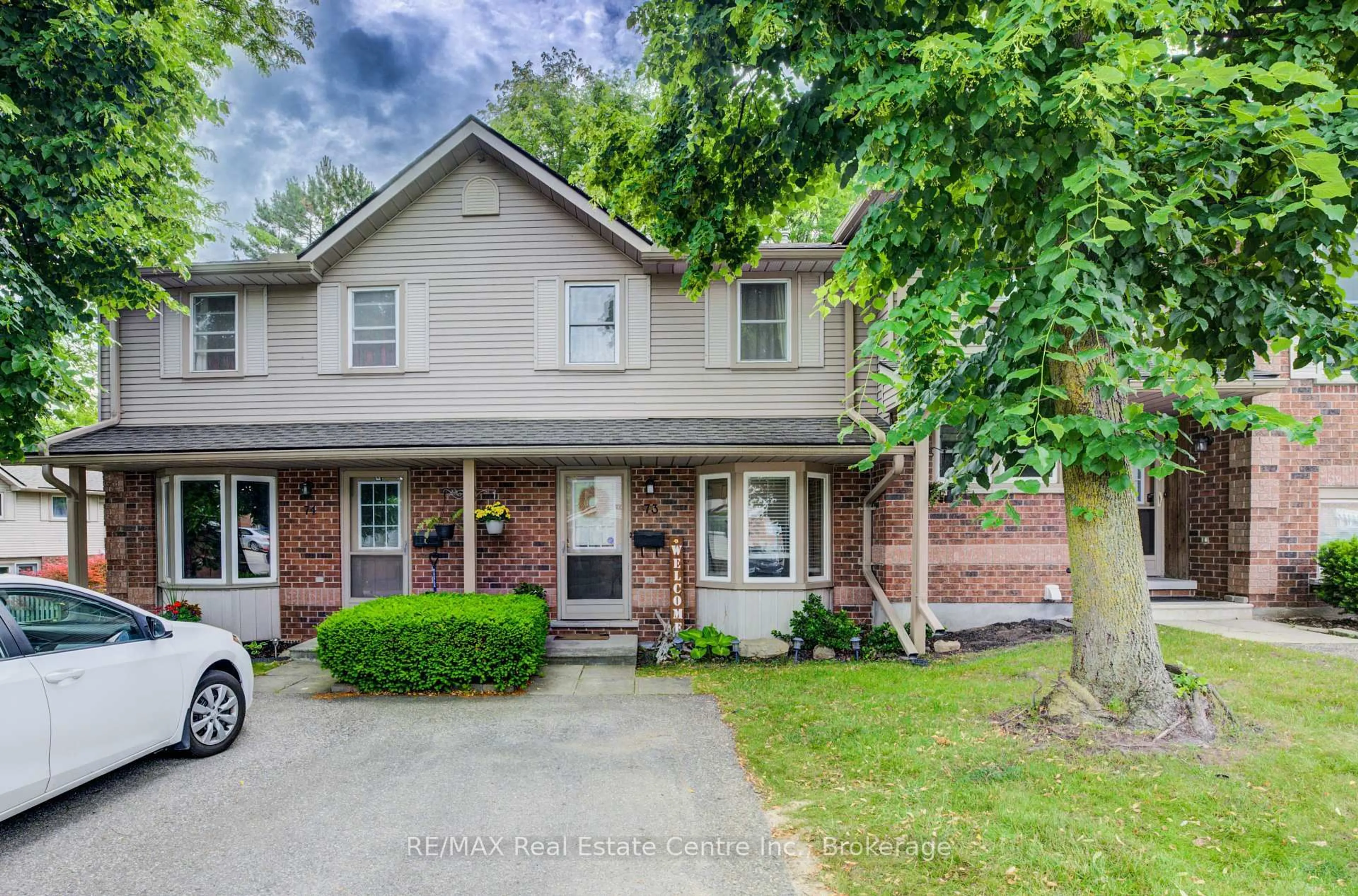 Home with brick exterior material, street for 180 Marksam Rd #73, Guelph Ontario N1H 8G6