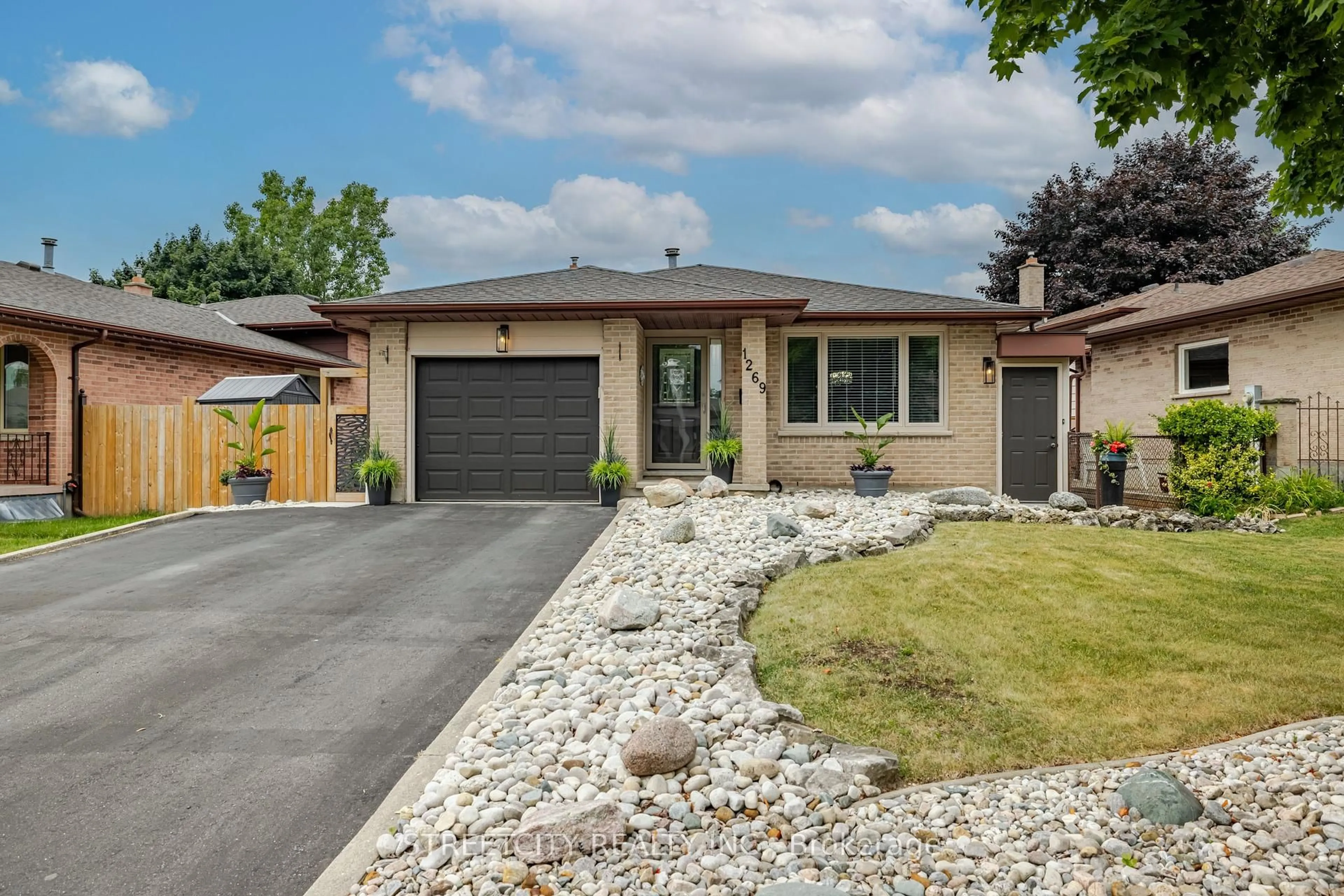 Home with brick exterior material, street for 1269 Delphi Rd, London East Ontario N5Y 5B3