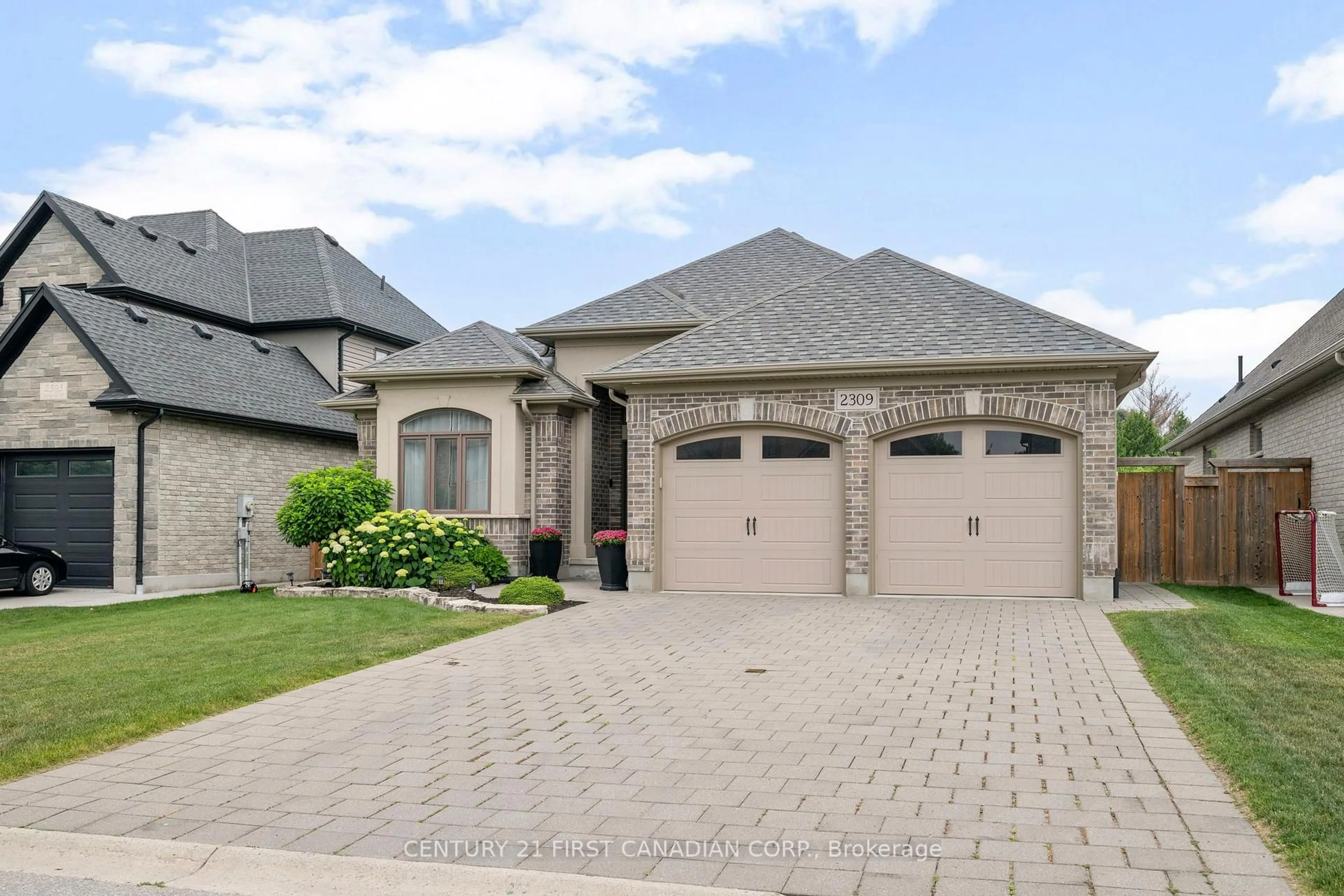Home with brick exterior material, street for 2309 Springridge Dr, London North Ontario N5X 0J7