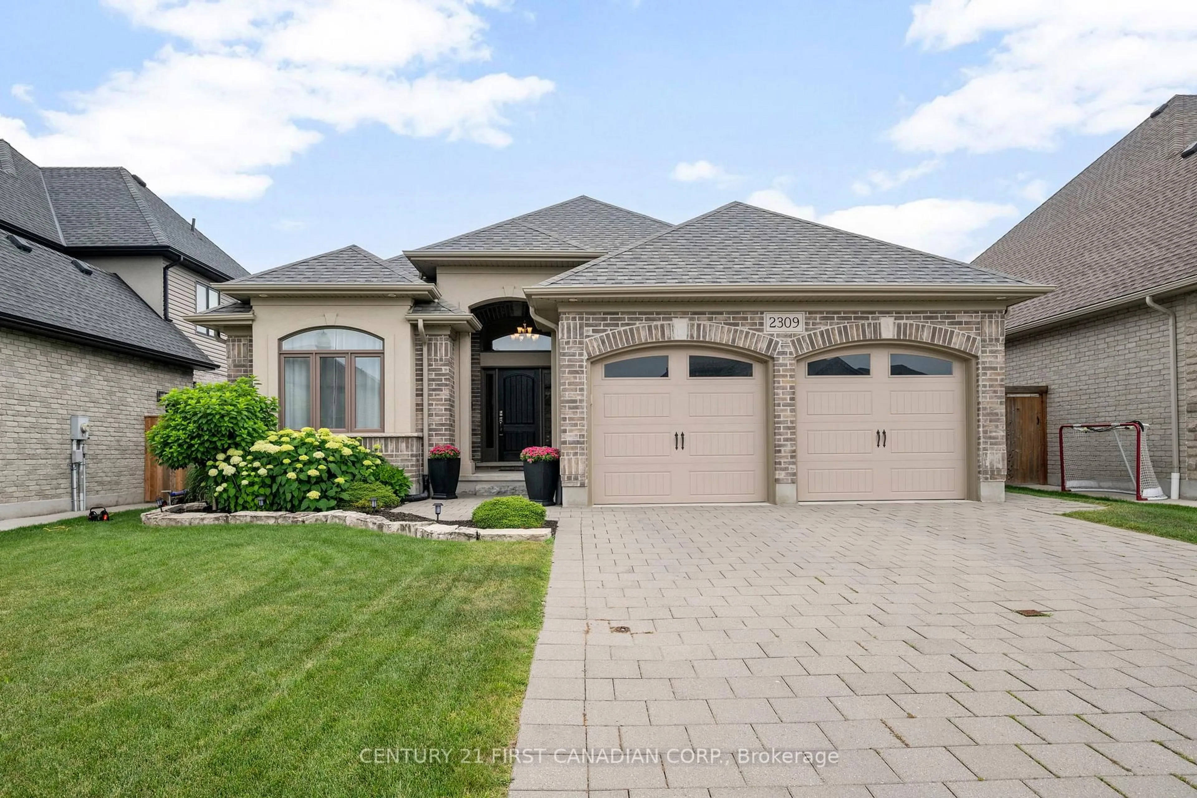 Home with brick exterior material, street for 2309 Springridge Dr, London North Ontario N5X 0J7