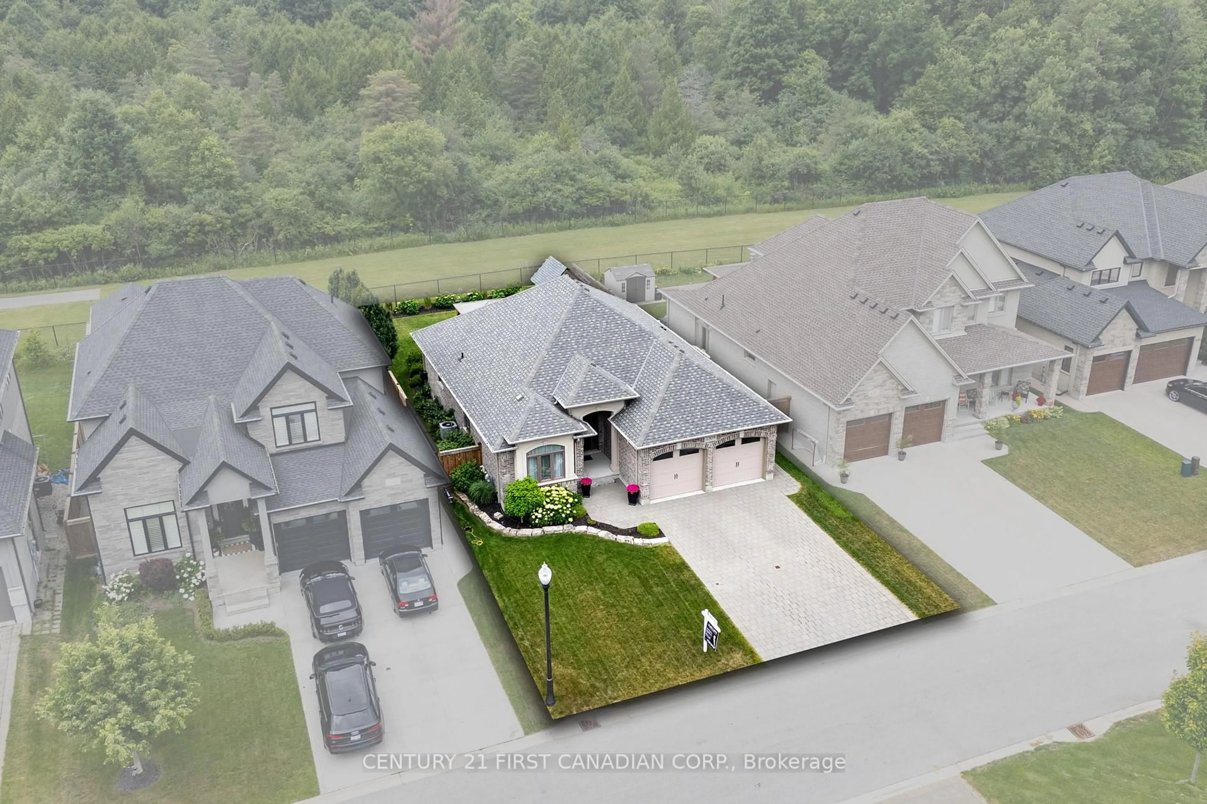 A pic from outside/outdoor area/front of a property/back of a property/a pic from drone, street for 2309 Springridge Dr, London North Ontario N5X 0J7