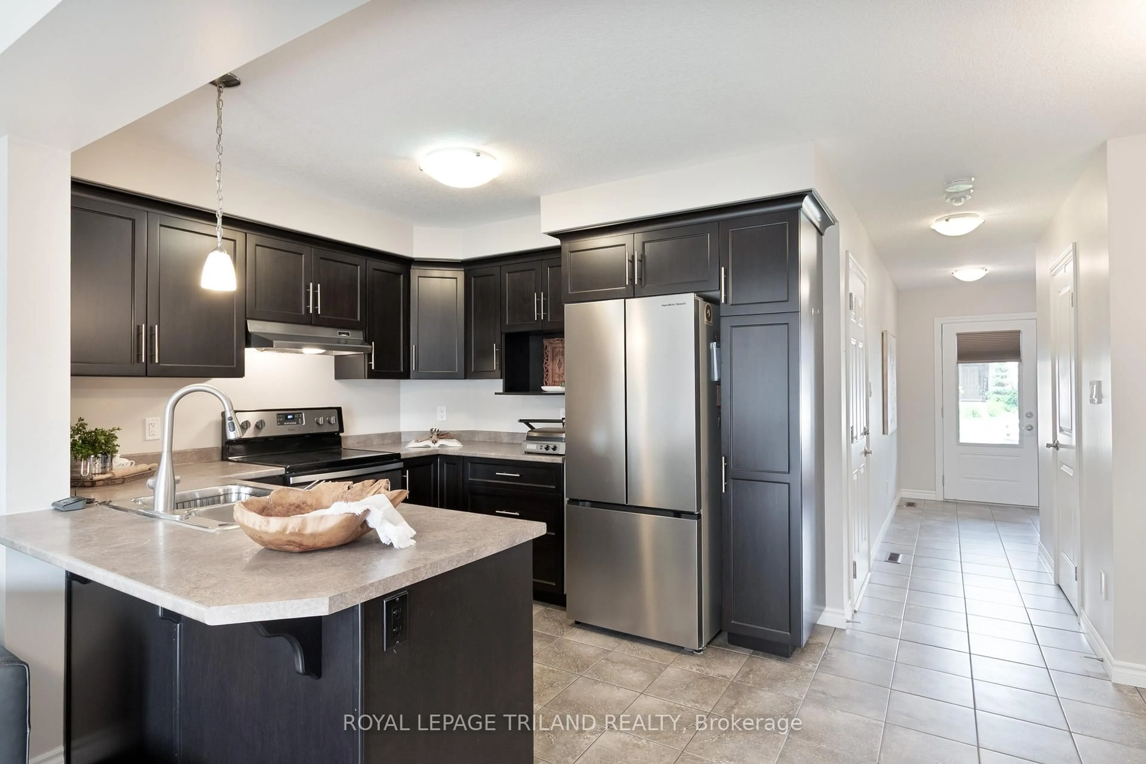 Open concept kitchen, ceramic/tile floor for 2027 Pennyroyal St, London North Ontario N5X 0L7