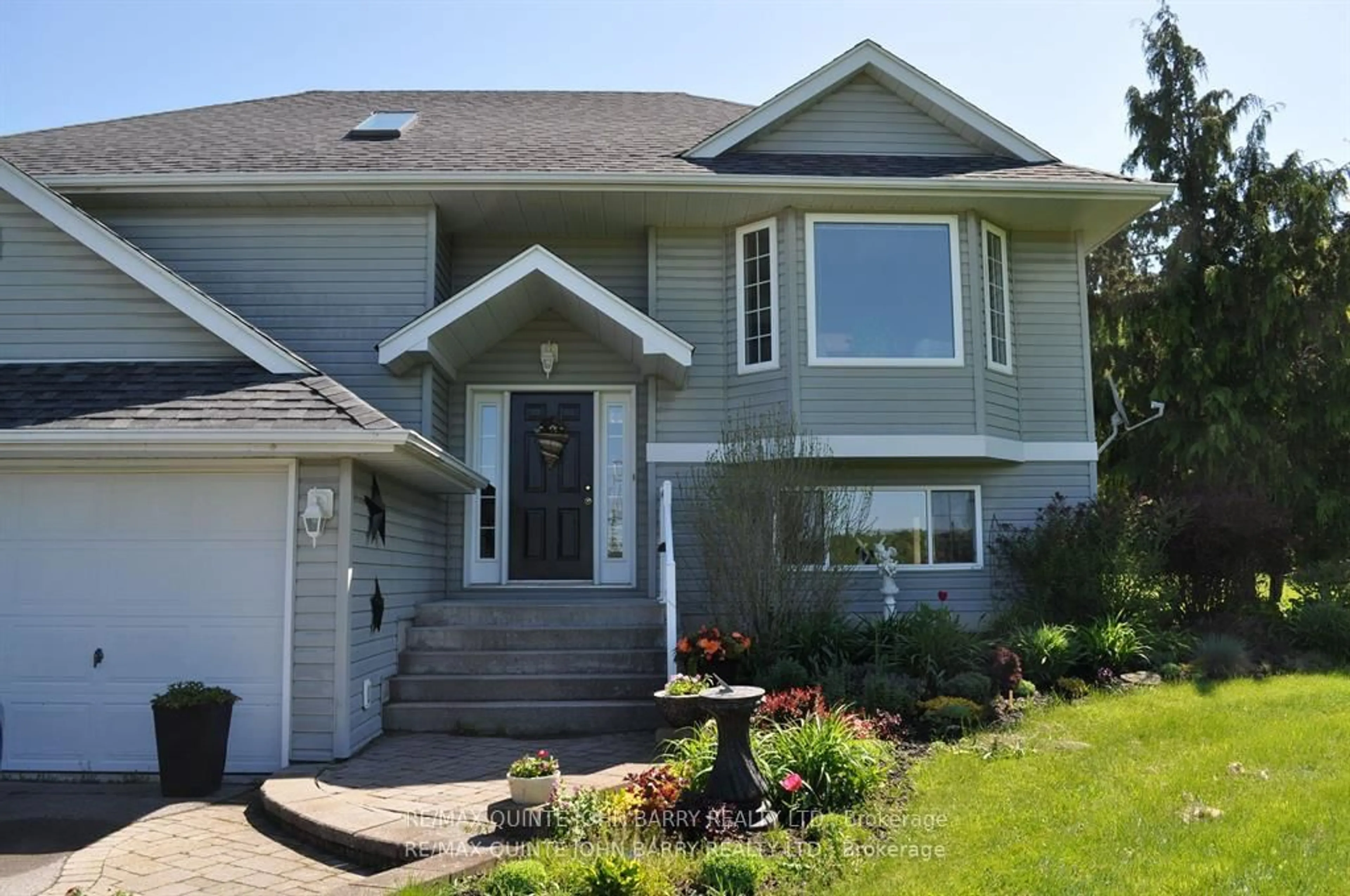 Home with vinyl exterior material, street for 77 Fitzgerald Rd, Quinte West Ontario K8V 0B1