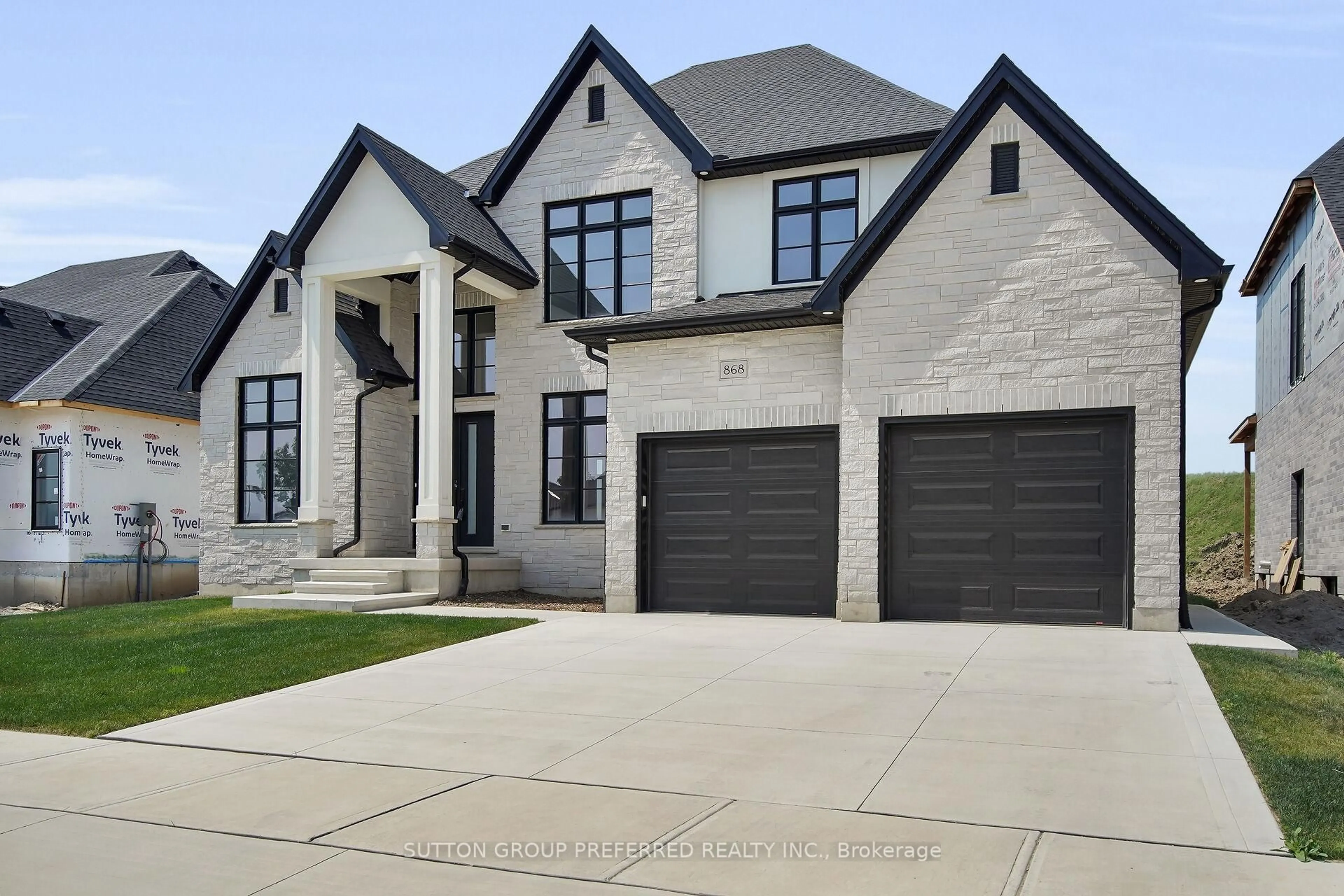 Home with brick exterior material, street for 868 EAGLETRACE Dr, London North Ontario N6G 3X9