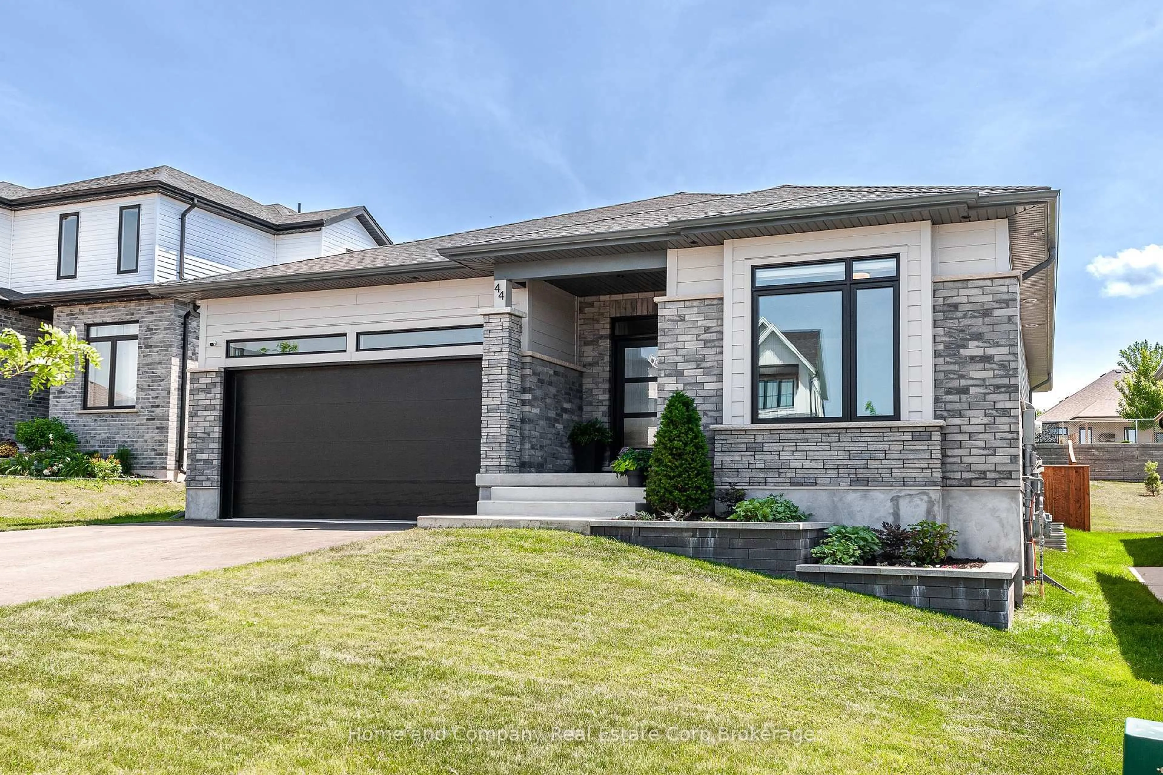 Home with brick exterior material, street for 44 Ridgewood Cres, St. Marys Ontario N4X 1E8