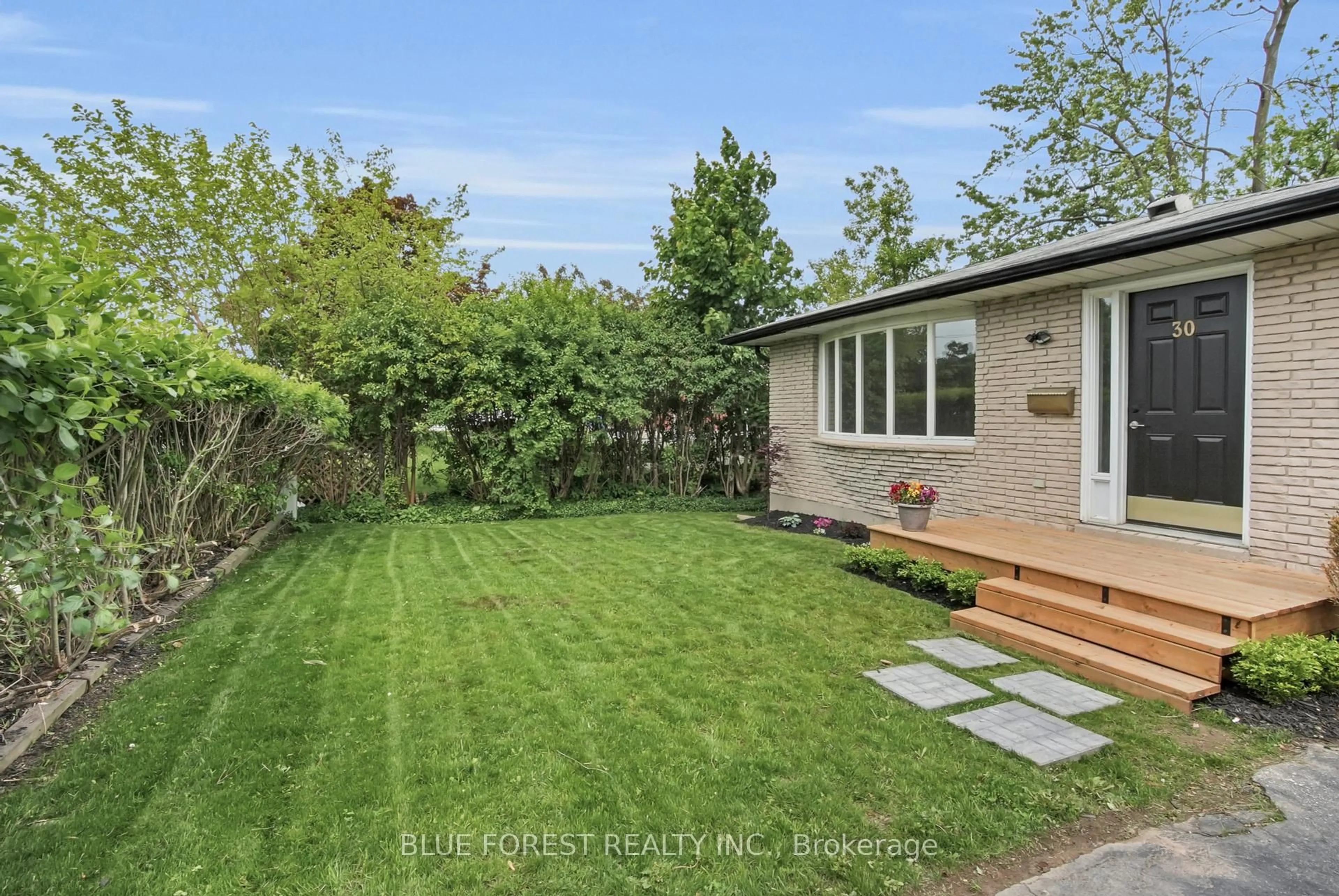 A pic from outside/outdoor area/front of a property/back of a property/a pic from drone, street for 30 Baseline Rd, London South Ontario N6C 2N5