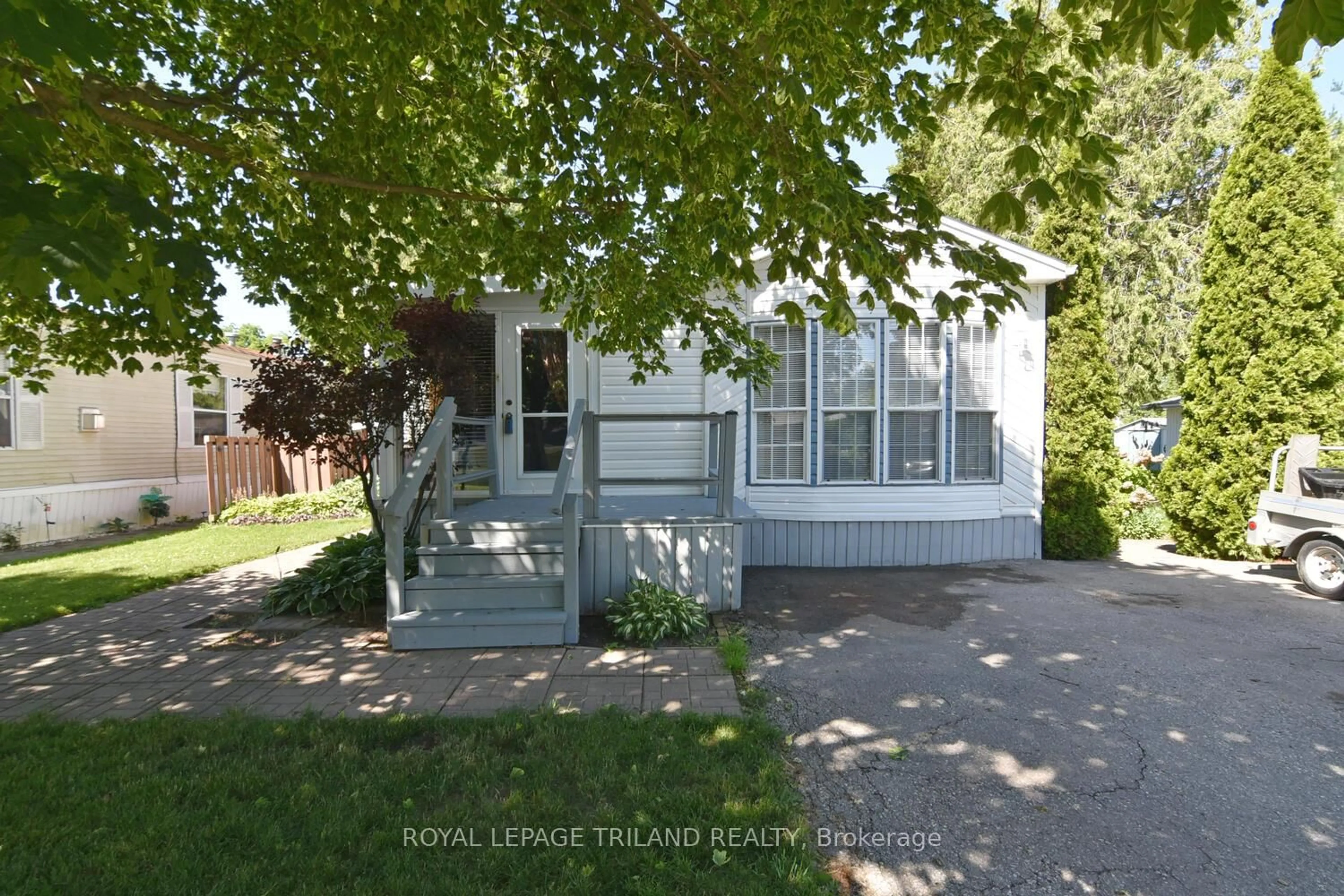 Home with vinyl exterior material, street for 9385 Ipperwash Rd #8, Lambton Shores Ontario N0N 1J3