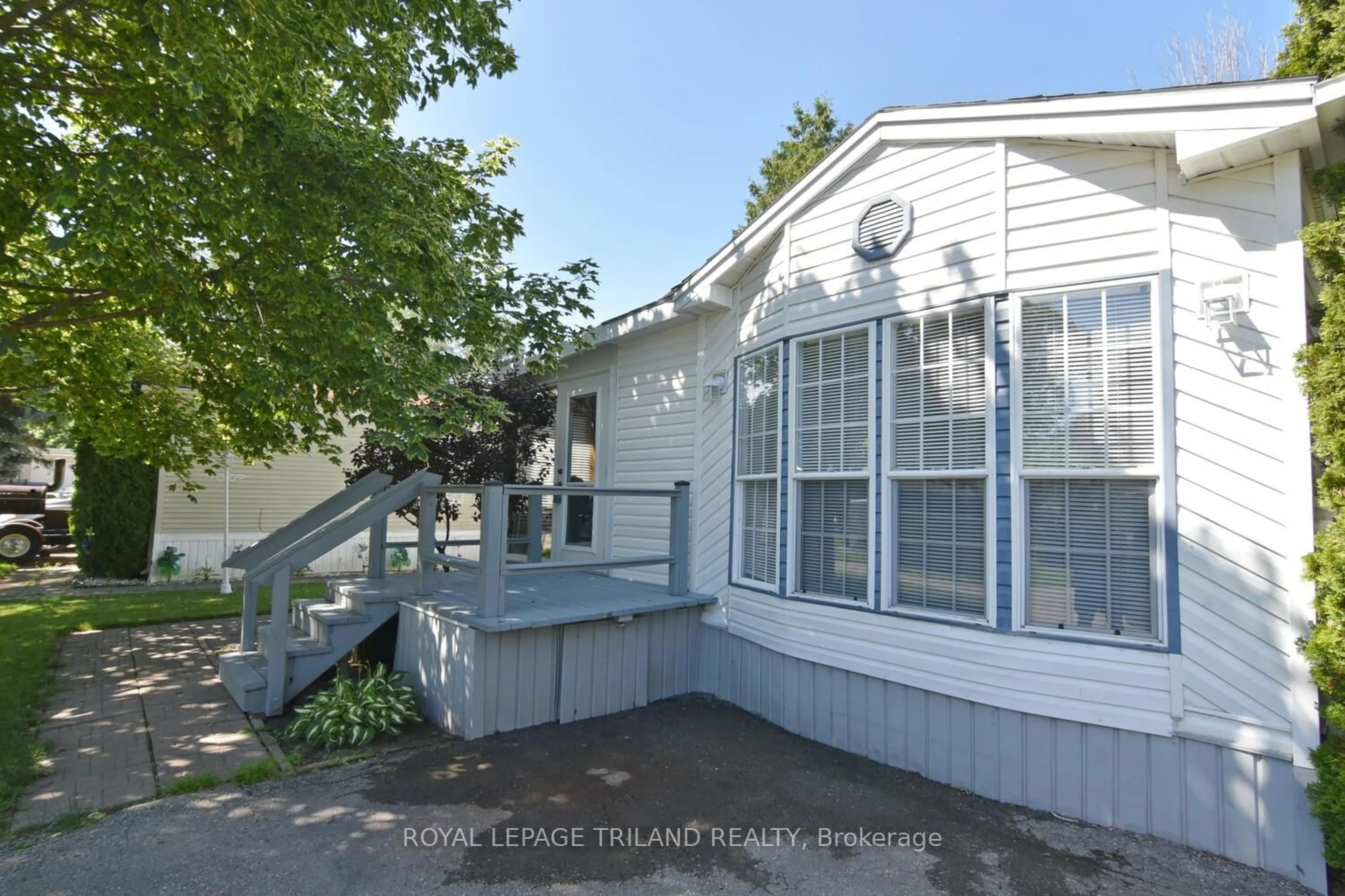 Home with vinyl exterior material, street for 9385 Ipperwash Rd #8, Lambton Shores Ontario N0N 1J3