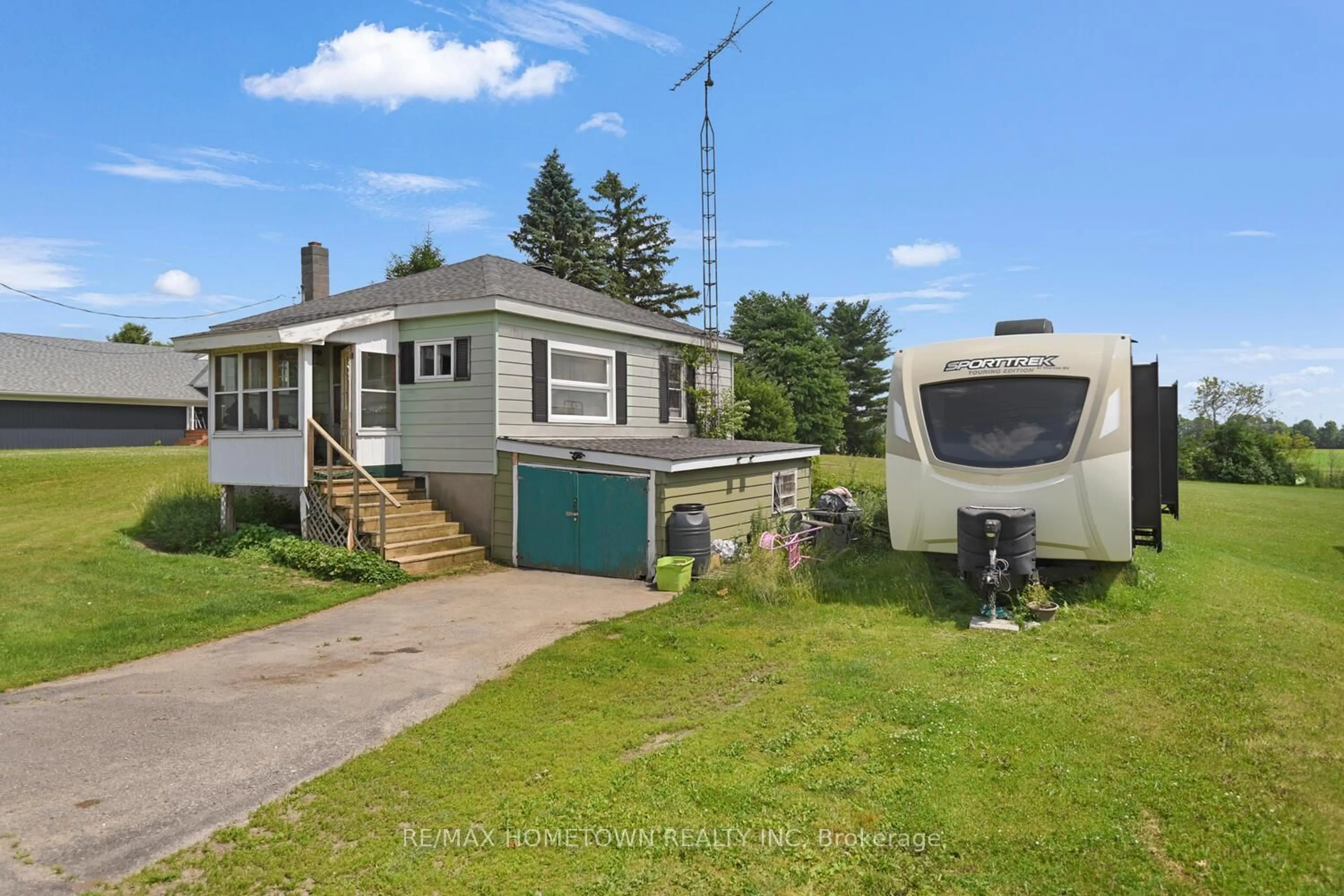 A pic from outside/outdoor area/front of a property/back of a property/a pic from drone, street for 357 County Road 8 Rd, Rideau Lakes Ontario K0G 1E0