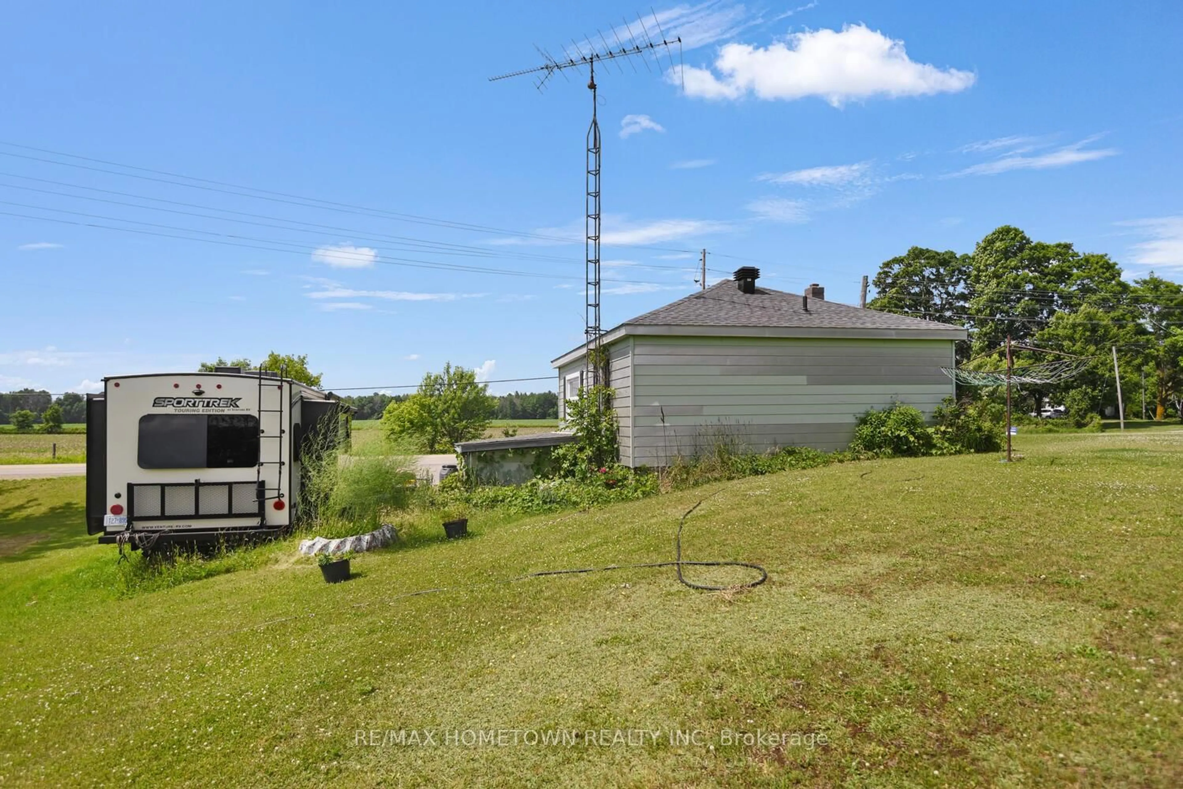 A pic from outside/outdoor area/front of a property/back of a property/a pic from drone, unknown for 357 County Road 8 Rd, Rideau Lakes Ontario K0G 1E0