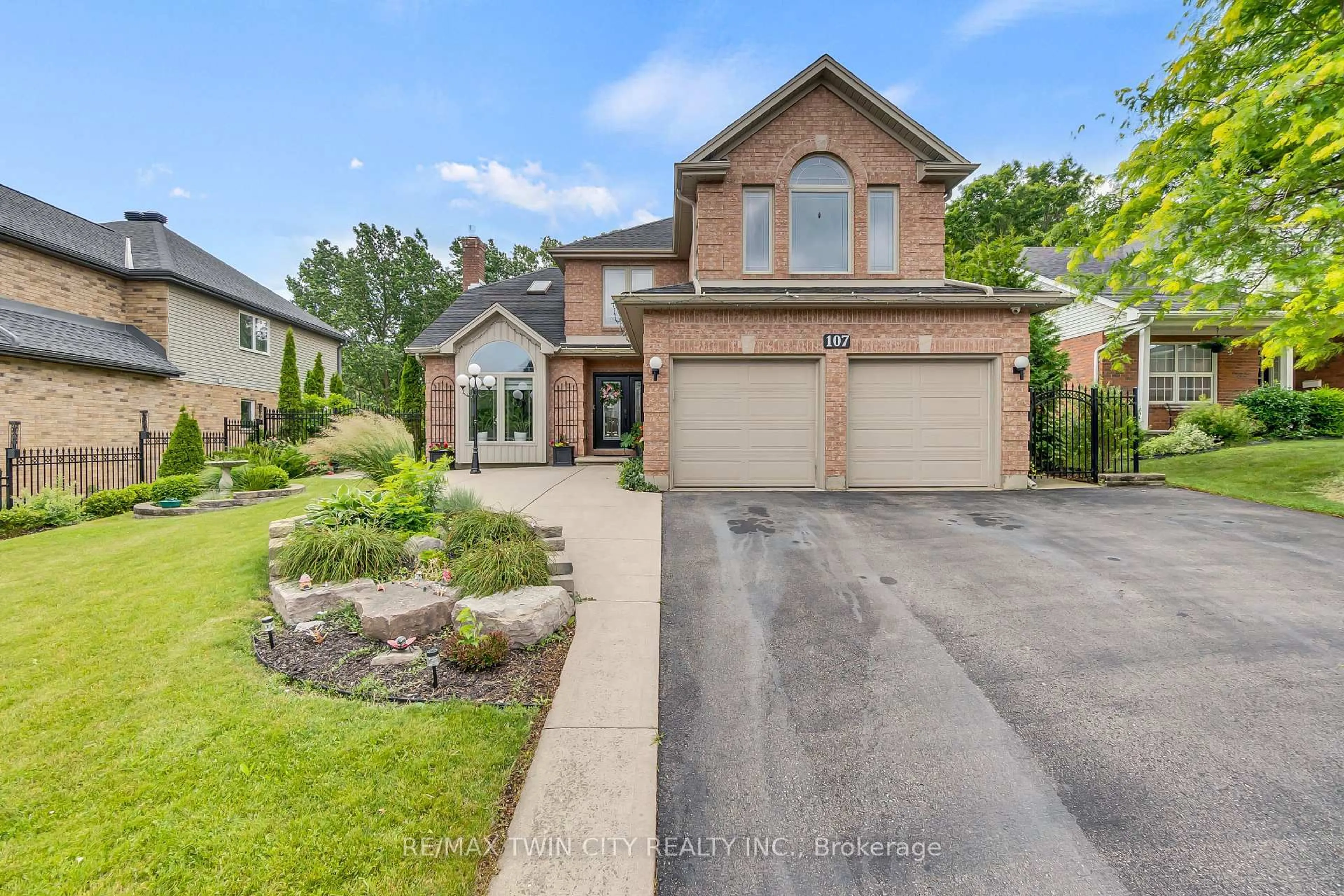 Home with brick exterior material, street for 107 Chandos Dr, Kitchener Ontario N2A 3Z4