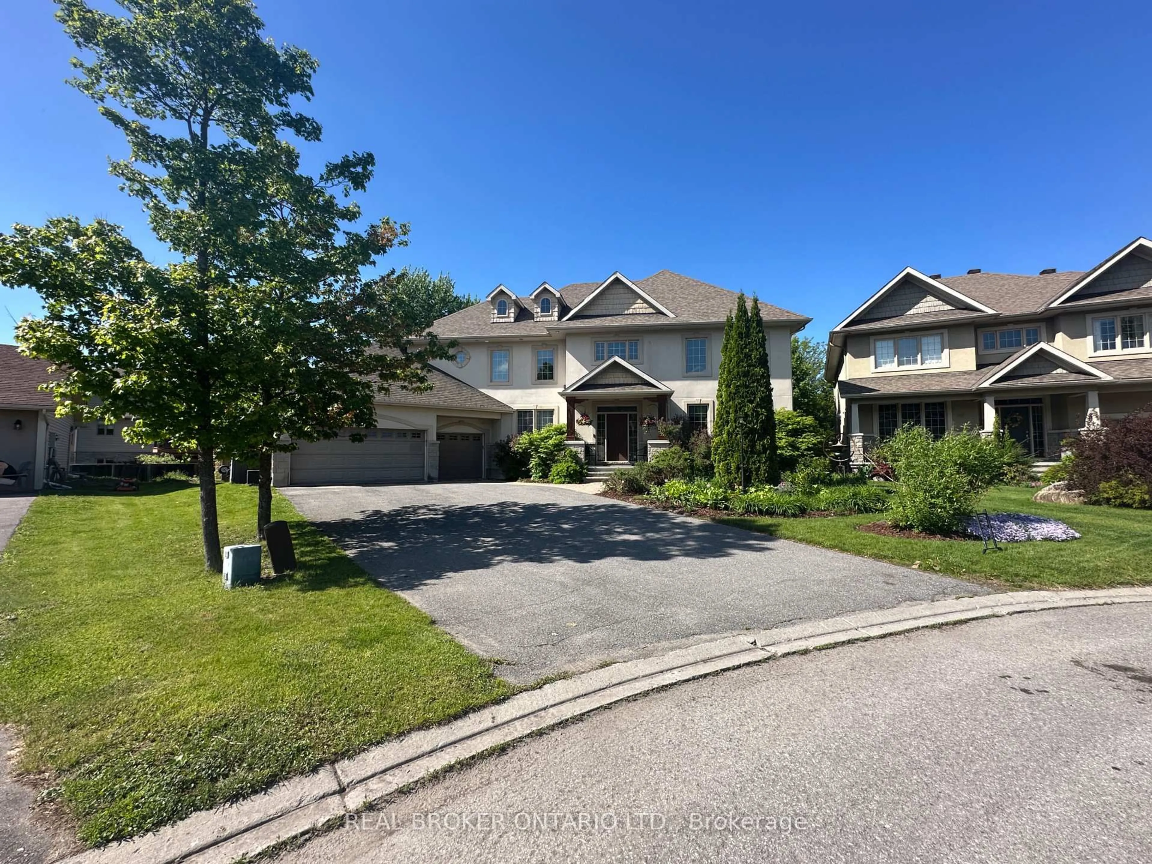 A pic from outside/outdoor area/front of a property/back of a property/a pic from drone, street for 221 Jensen Crt, Carp Ontario K0A 1L0