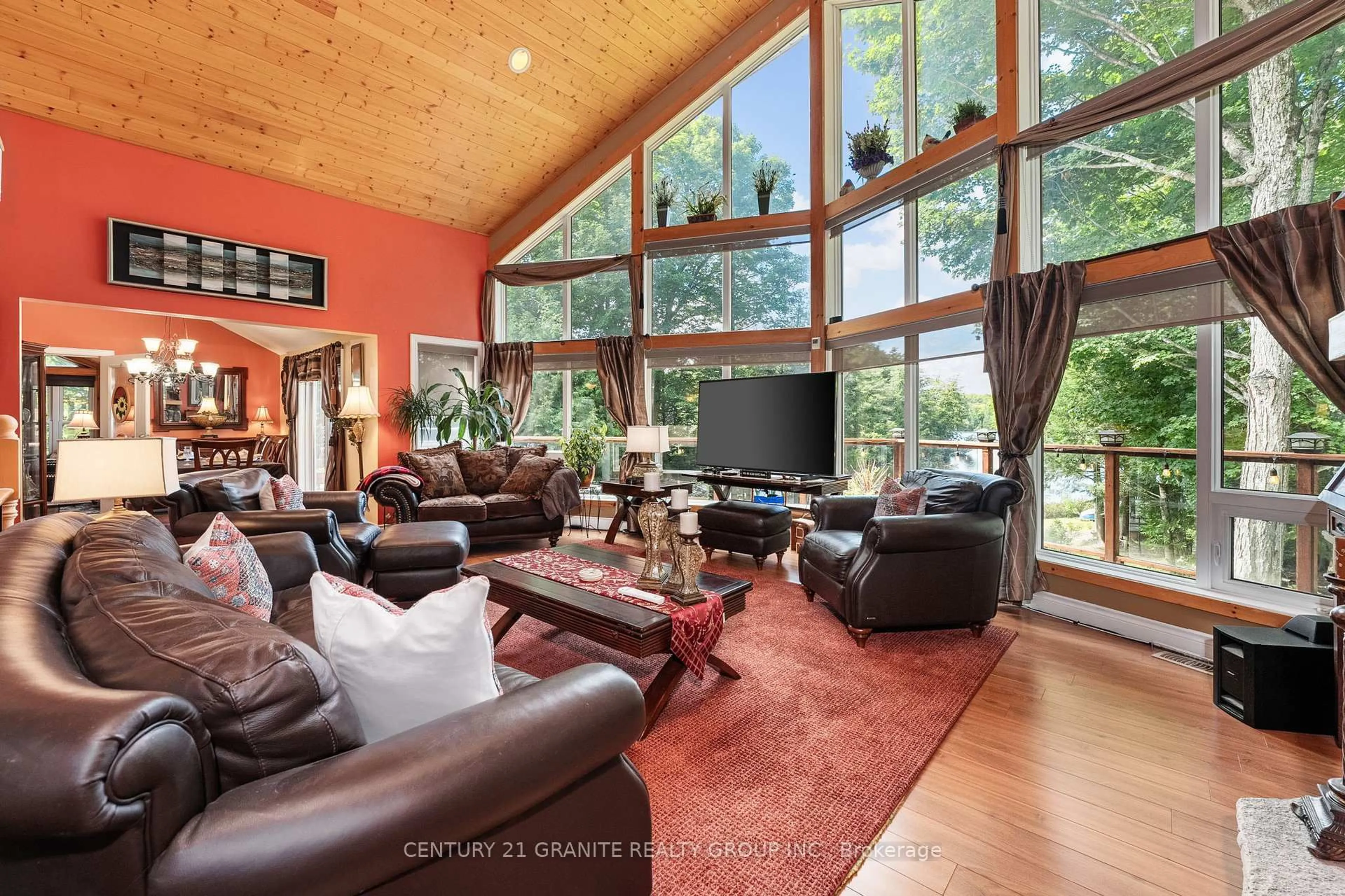 Living room with furniture, wood/laminate floor for 1238 Houston Rd, Highlands East Ontario K0L 1C0