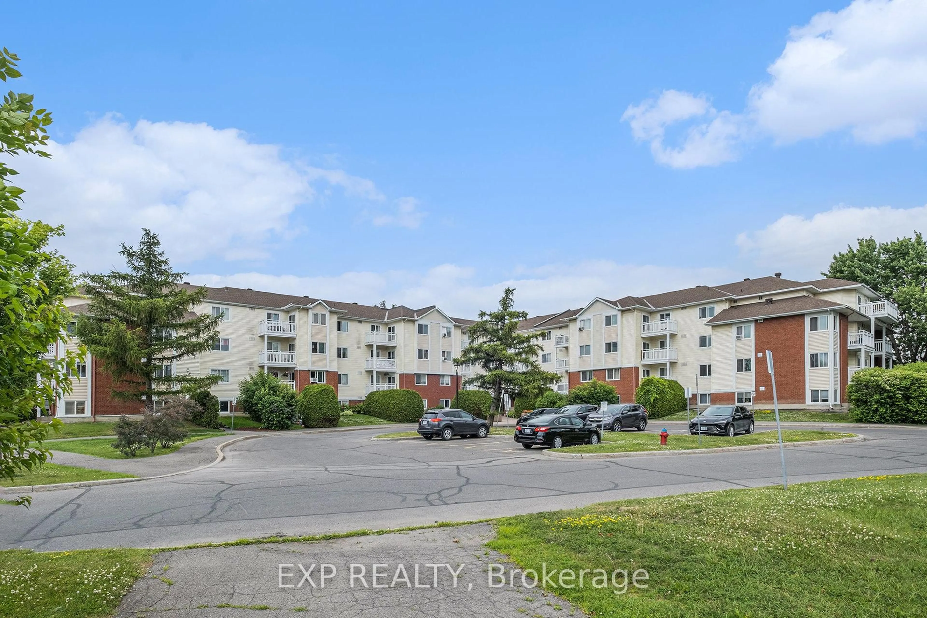 A pic from outside/outdoor area/front of a property/back of a property/a pic from drone, unknown for 270 Lorry Greenberg Dr #14, Ottawa Ontario K1T 3K2