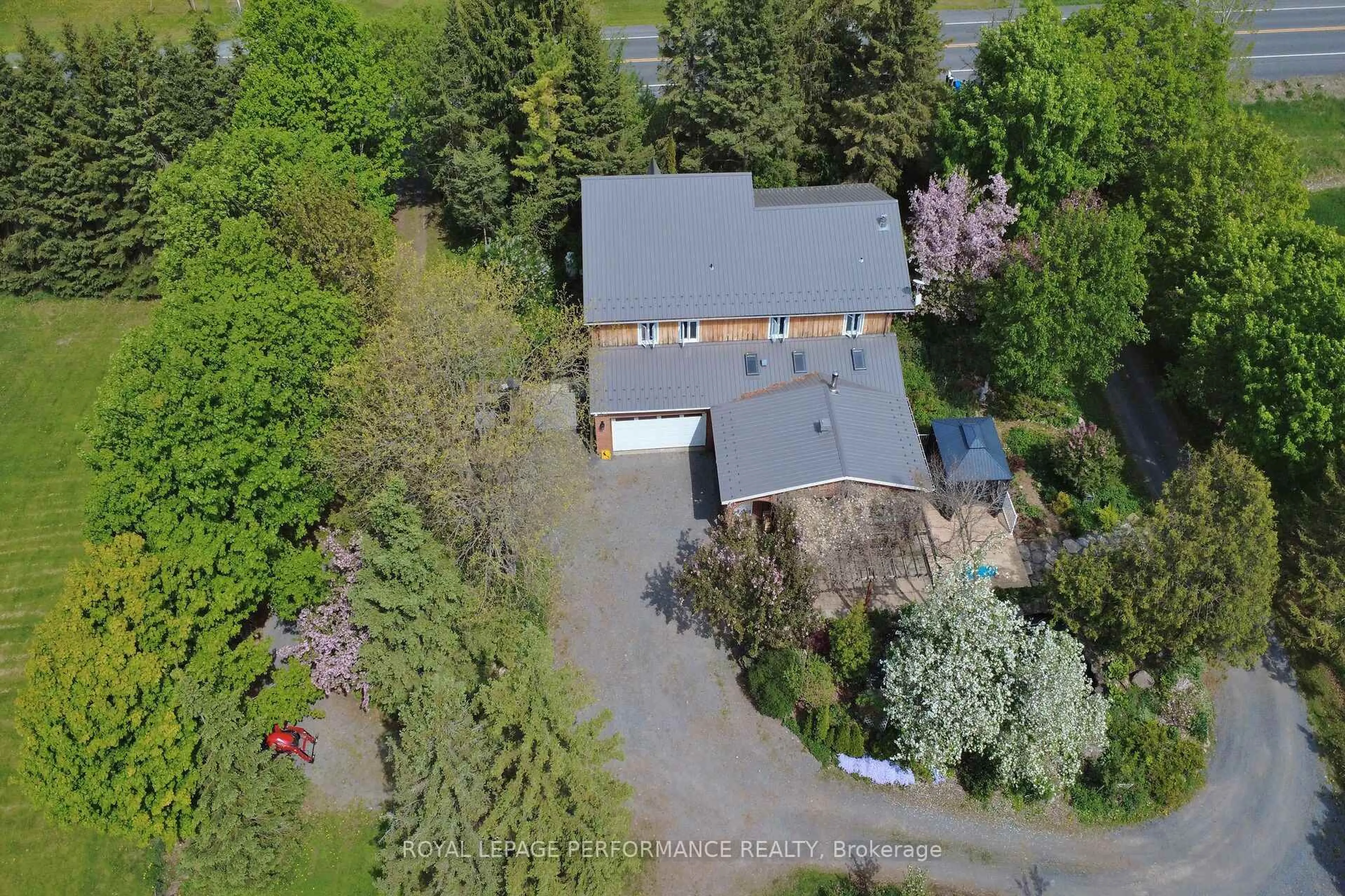 A pic from outside/outdoor area/front of a property/back of a property/a pic from drone, street for 14120 County Road 13 Rd, North Stormont Ontario K0A 1R0
