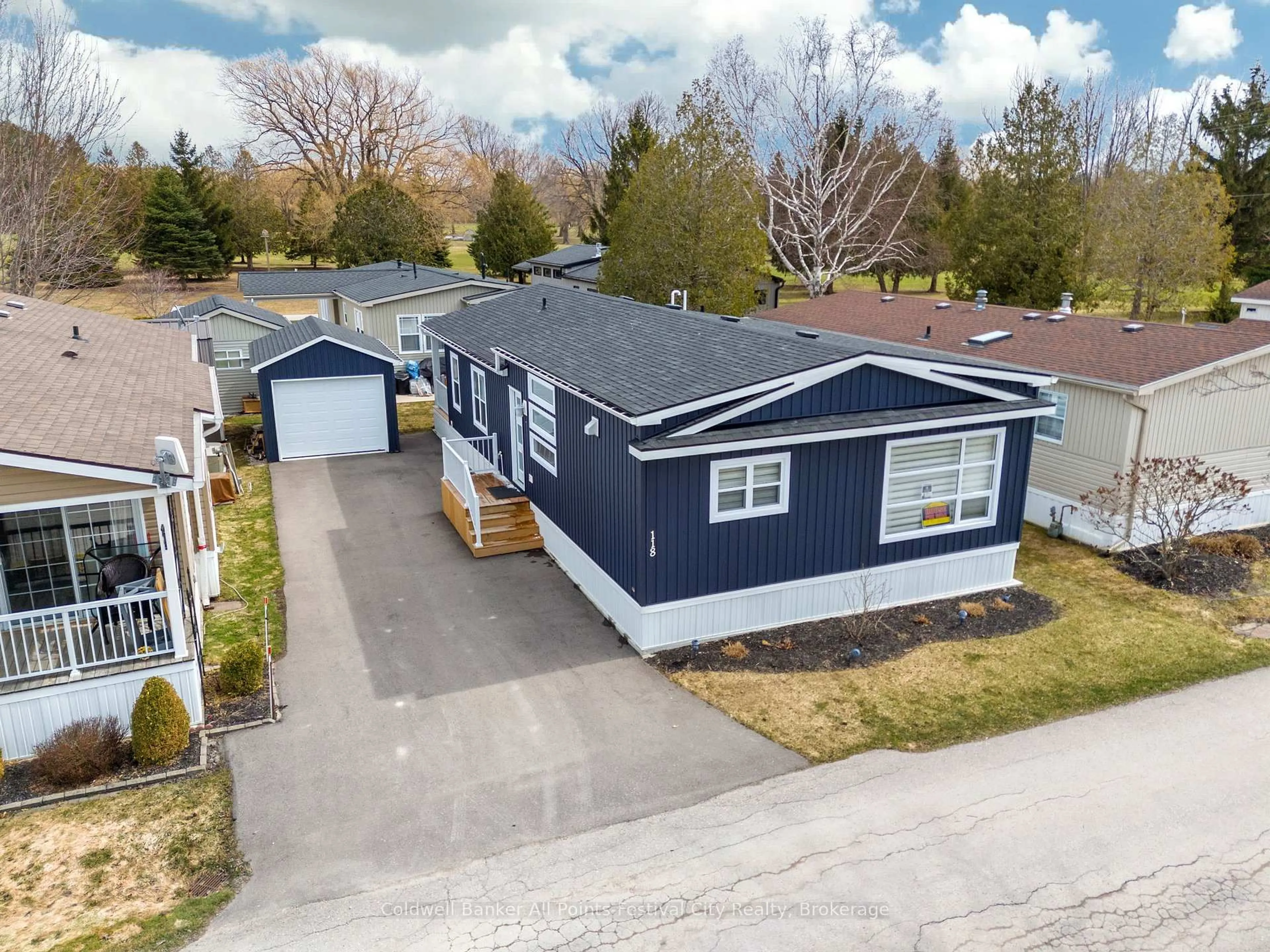 A pic from outside/outdoor area/front of a property/back of a property/a pic from drone, street for 77416 Bluewater Highway, Bluewater Ontario N0M 1G0