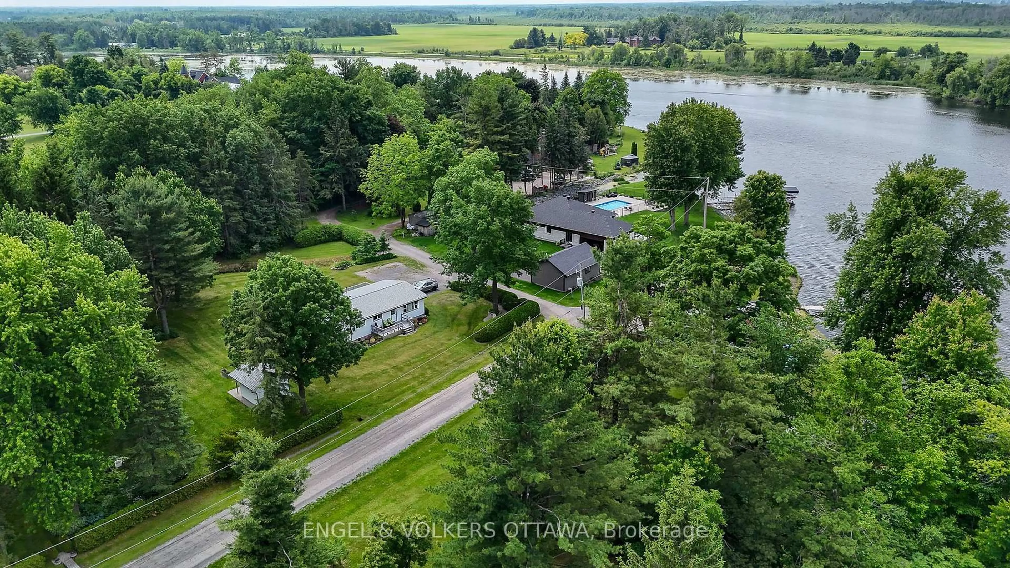 A pic from outside/outdoor area/front of a property/back of a property/a pic from drone, water/lake/river/ocean view for 3250E River Rd, Ottawa Ontario K4M 1B4