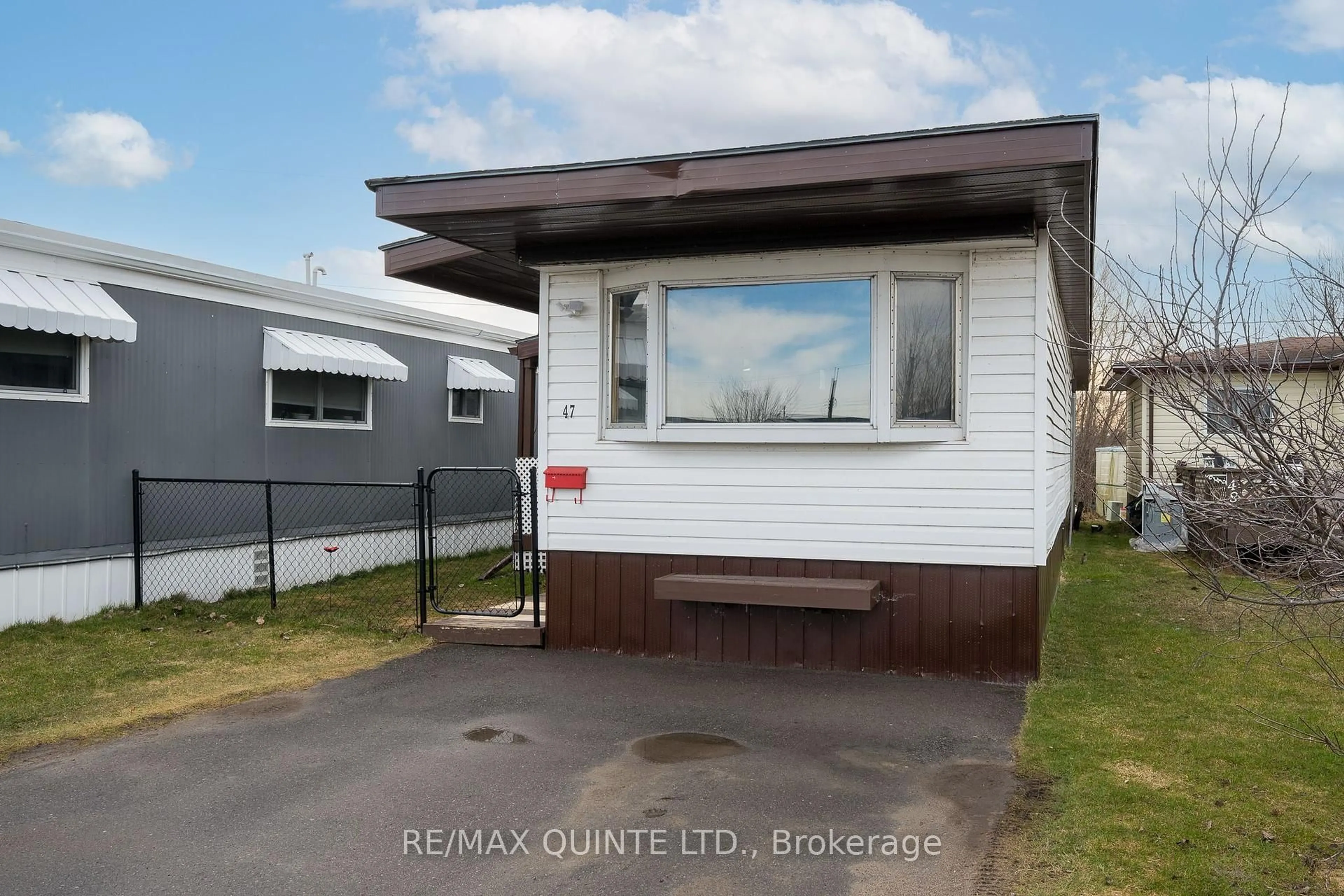 Home with vinyl exterior material, street for 311 Dundas St #47, Quinte West Ontario K8V 3E5