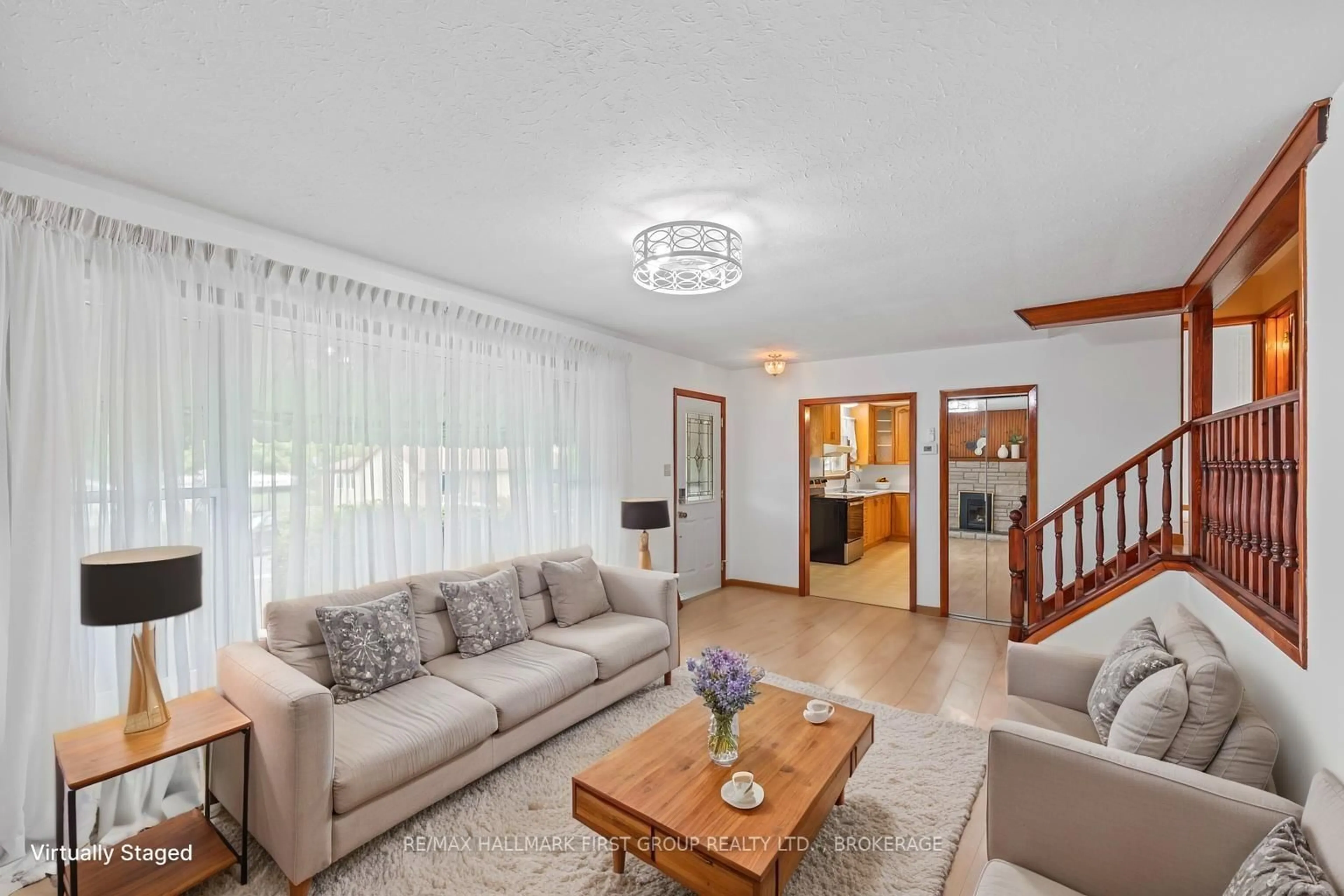 Living room with furniture, wood/laminate floor for 73 Water St, Napanee Ontario K7R 1V6
