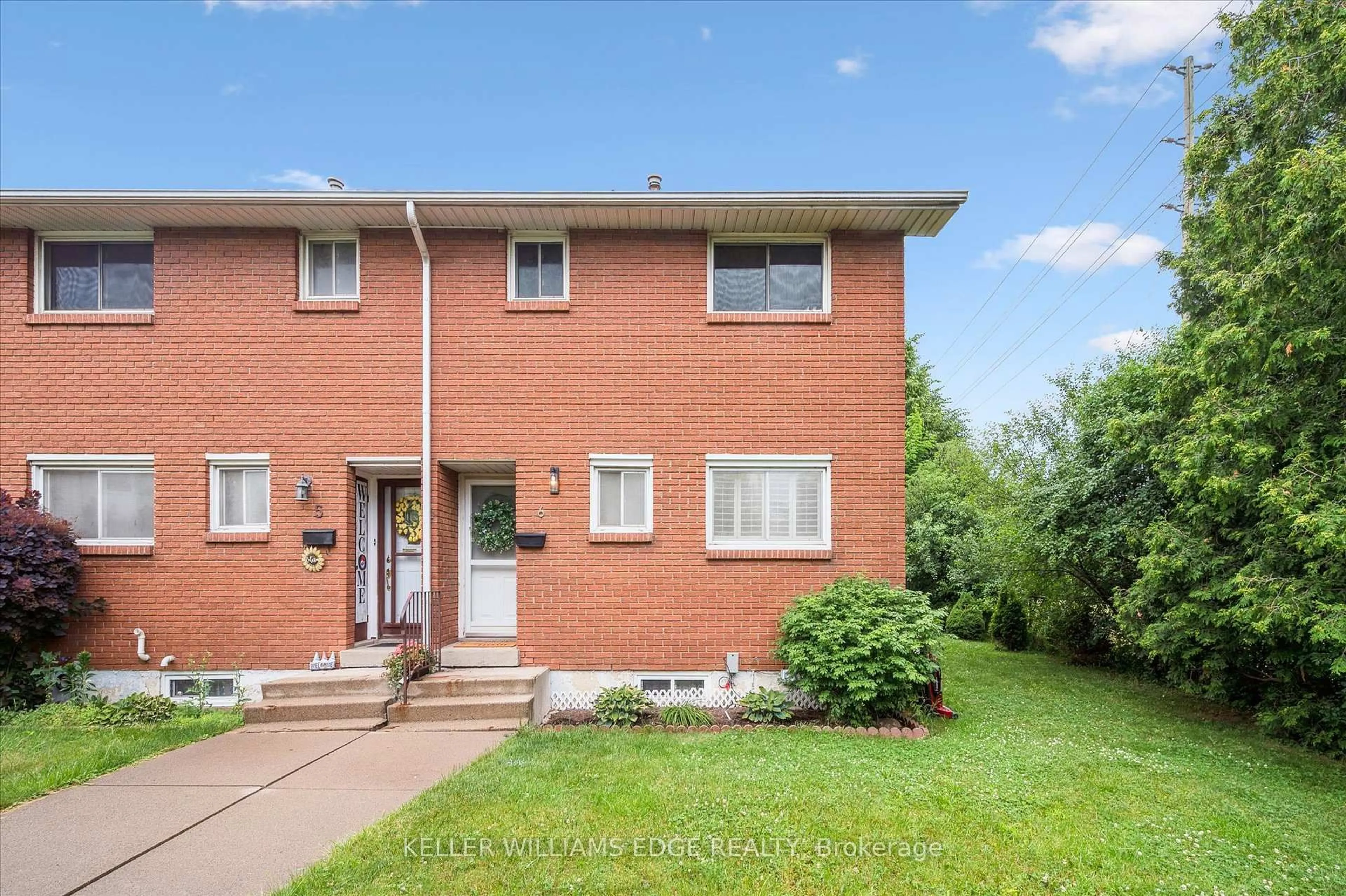 Home with brick exterior material, street for 161 Berkindale Dr #6, Hamilton Ontario L8E 1M6