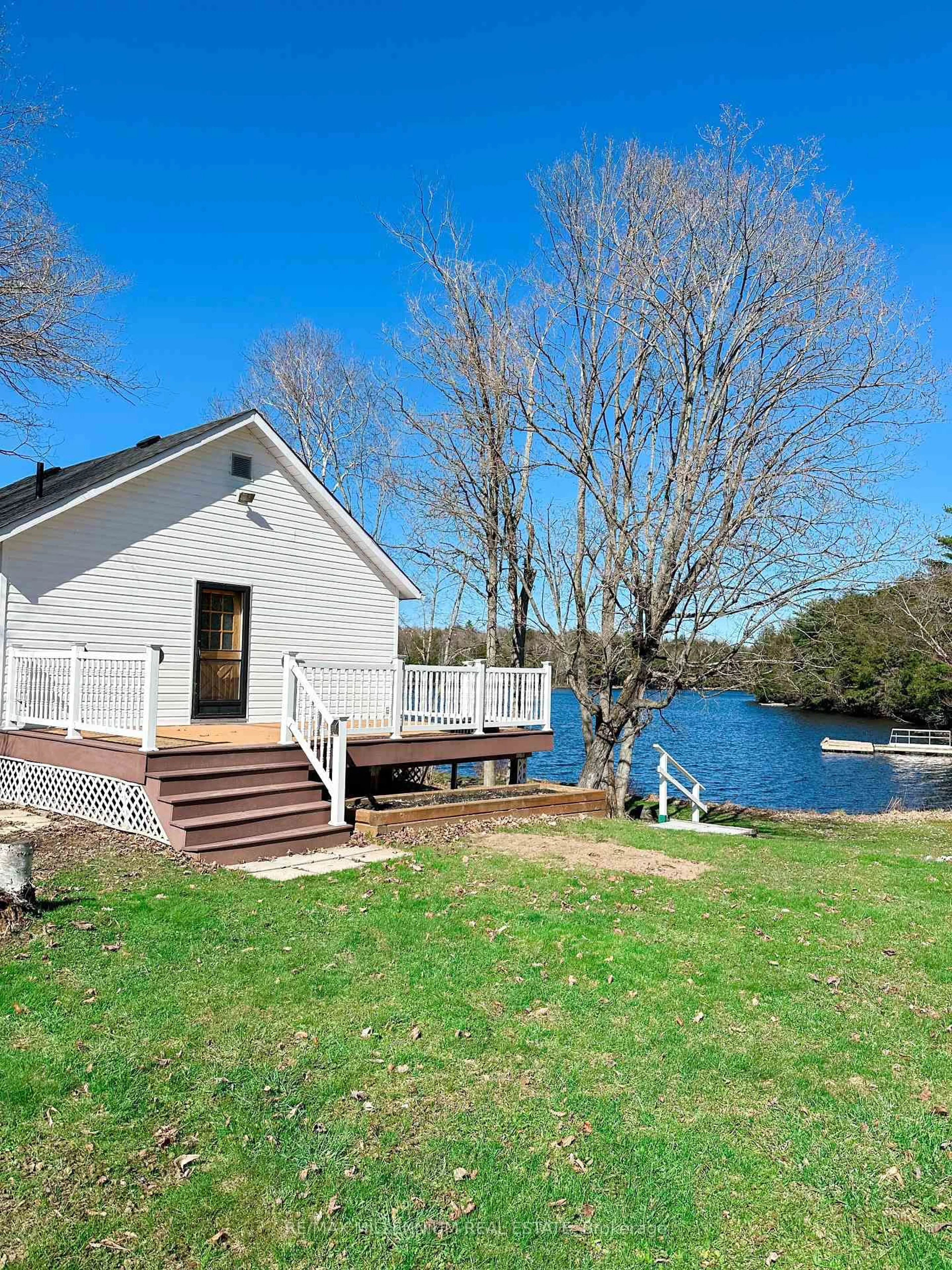 A pic from outside/outdoor area/front of a property/back of a property/a pic from drone, water/lake/river/ocean view for 695 Highway Highway #124, McKellar Ontario P0G 1C0