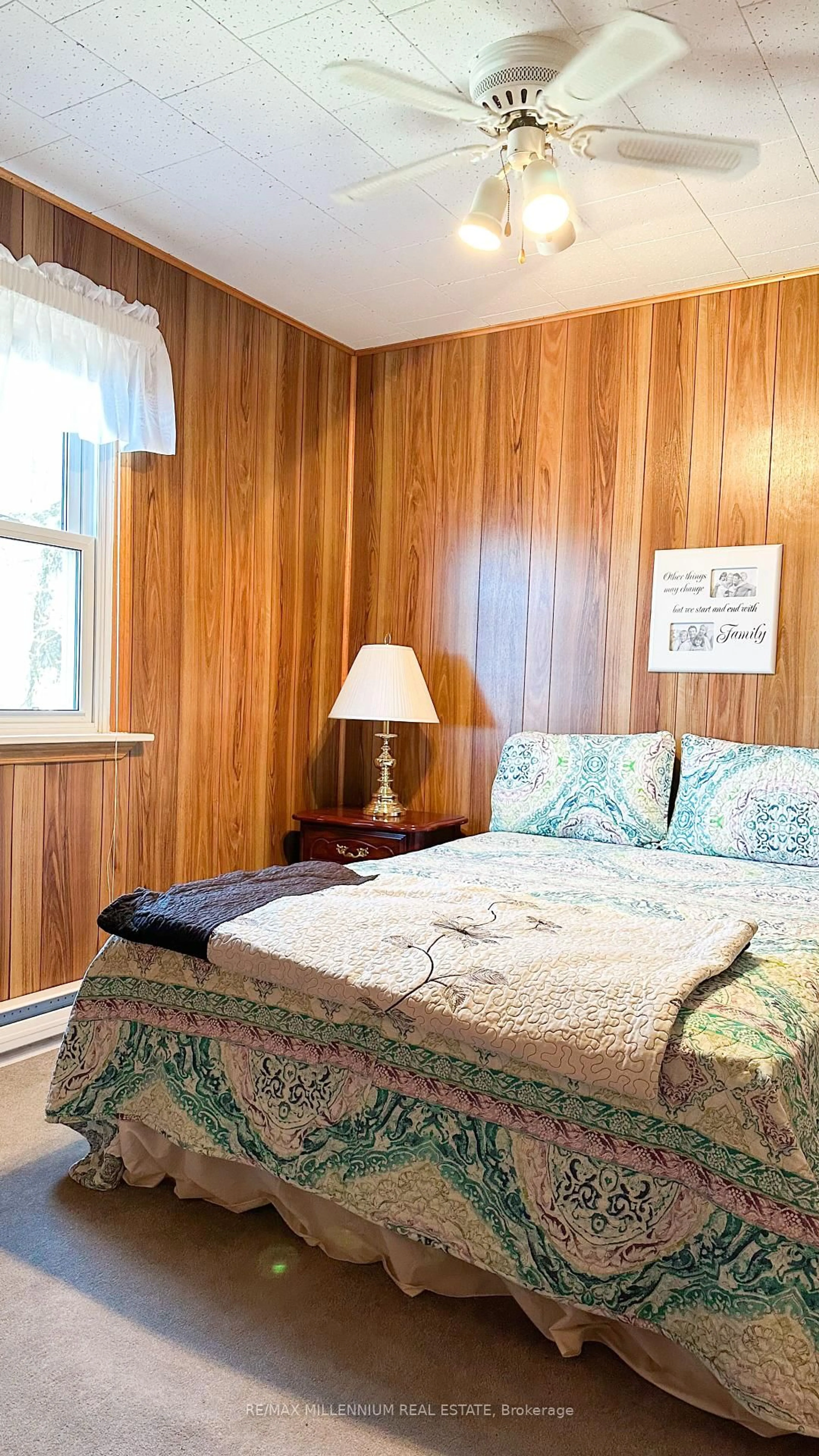 Bedroom with bed, wood/laminate floor for 695 Highway Highway #124, McKellar Ontario P0G 1C0