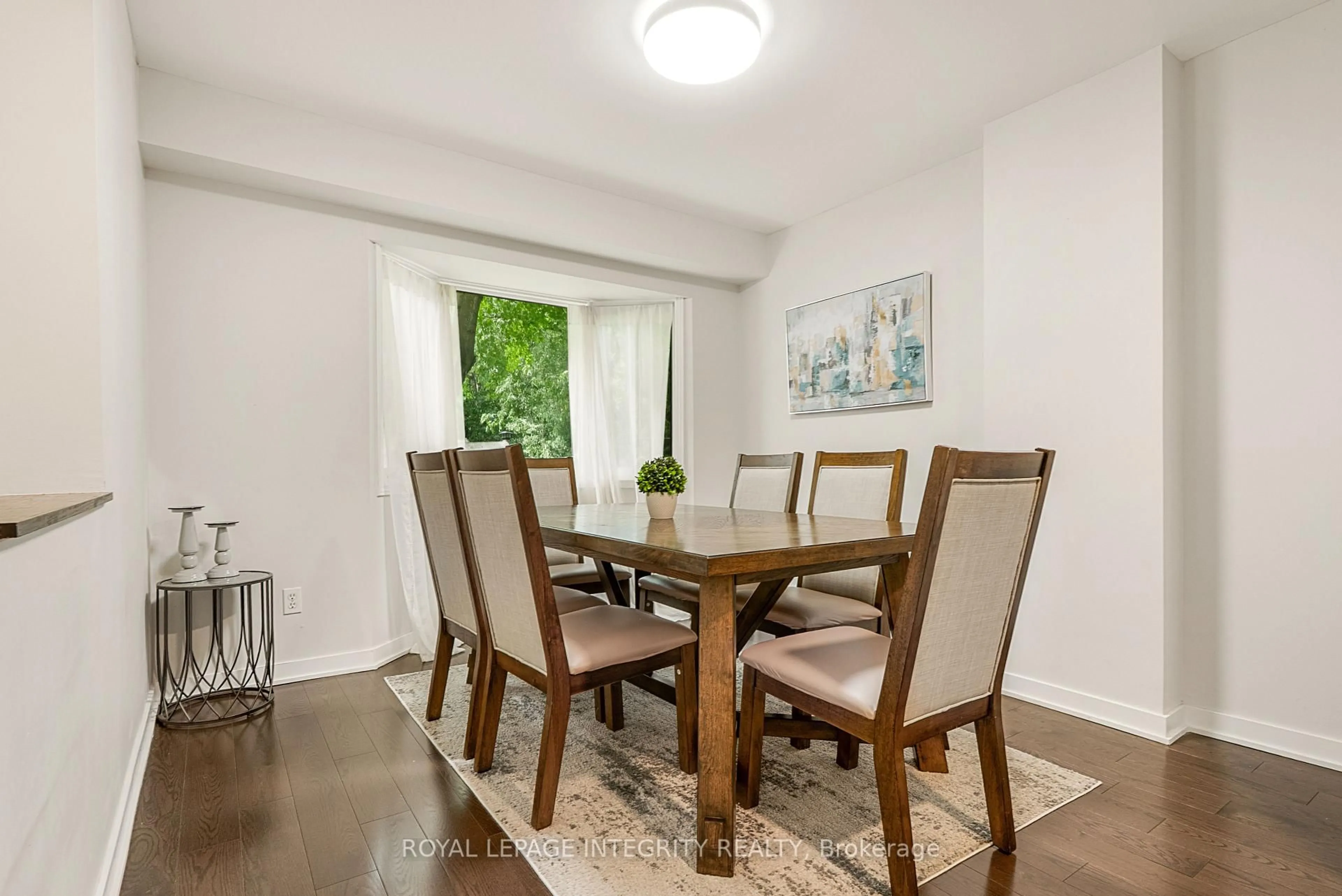 Dining room, wood/laminate floor for 82 Blackdome Cres, Ottawa Ontario K2T 1B1
