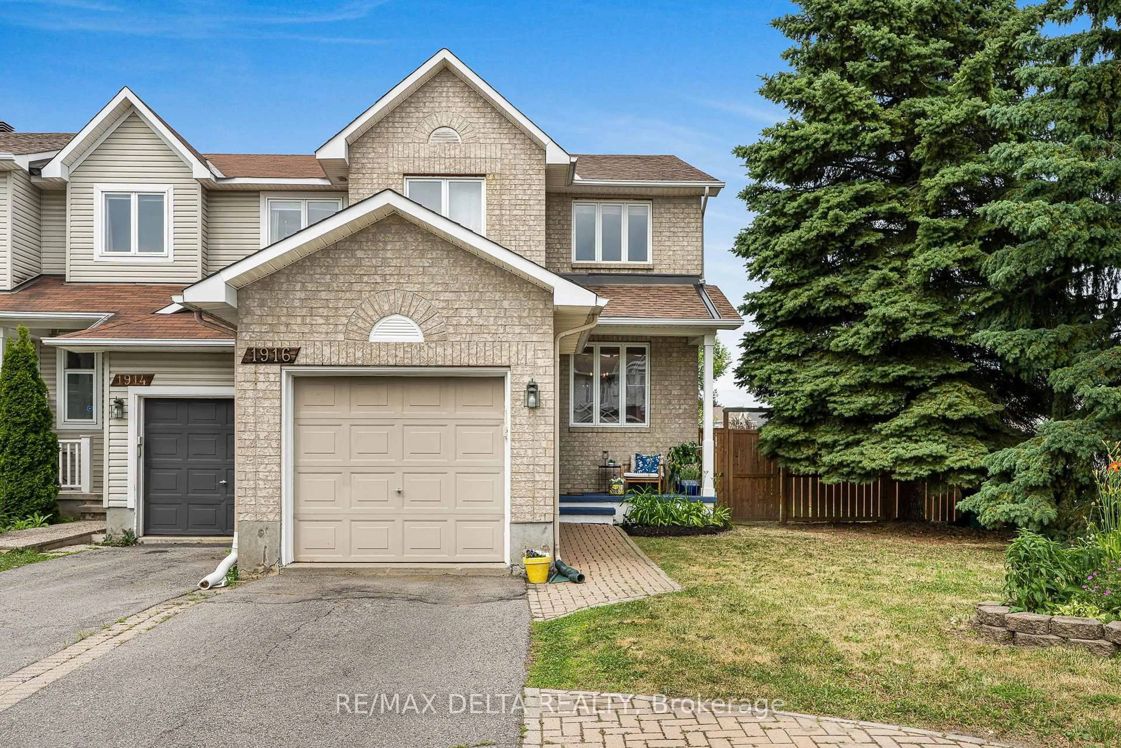 Home with brick exterior material, street for 1916 Hennessy Cres, Ottawa Ontario K4A 3X7