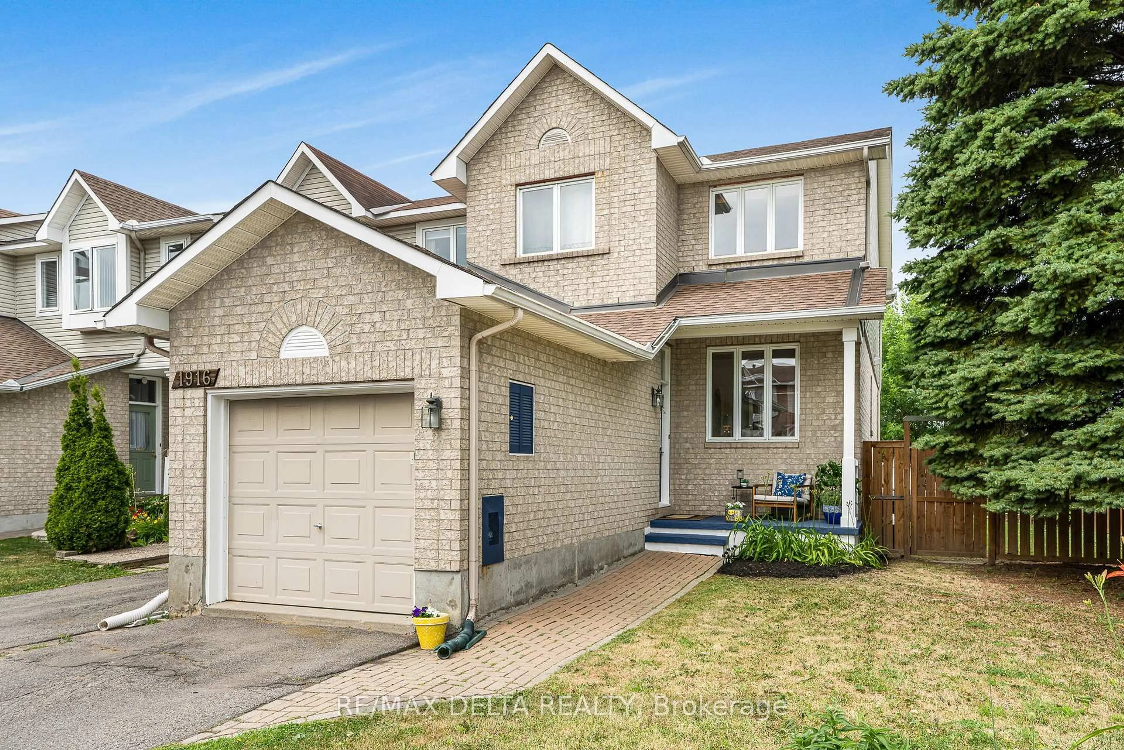 Home with brick exterior material, street for 1916 Hennessy Cres, Ottawa Ontario K4A 3X7