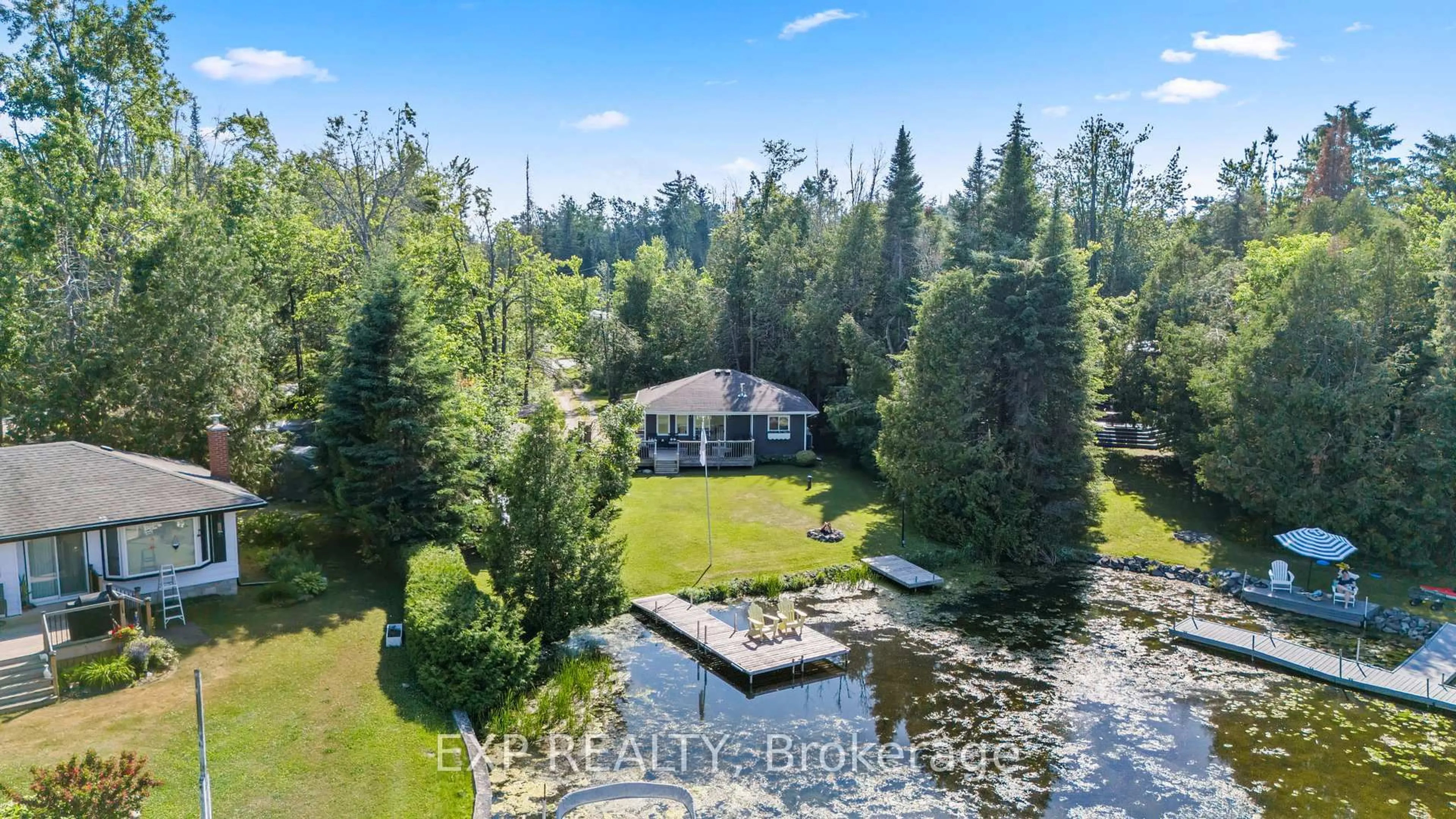 A pic from outside/outdoor area/front of a property/back of a property/a pic from drone, water/lake/river/ocean view for 46 Bayview Estate Rd, Kawartha Lakes Ontario K0M 1N0