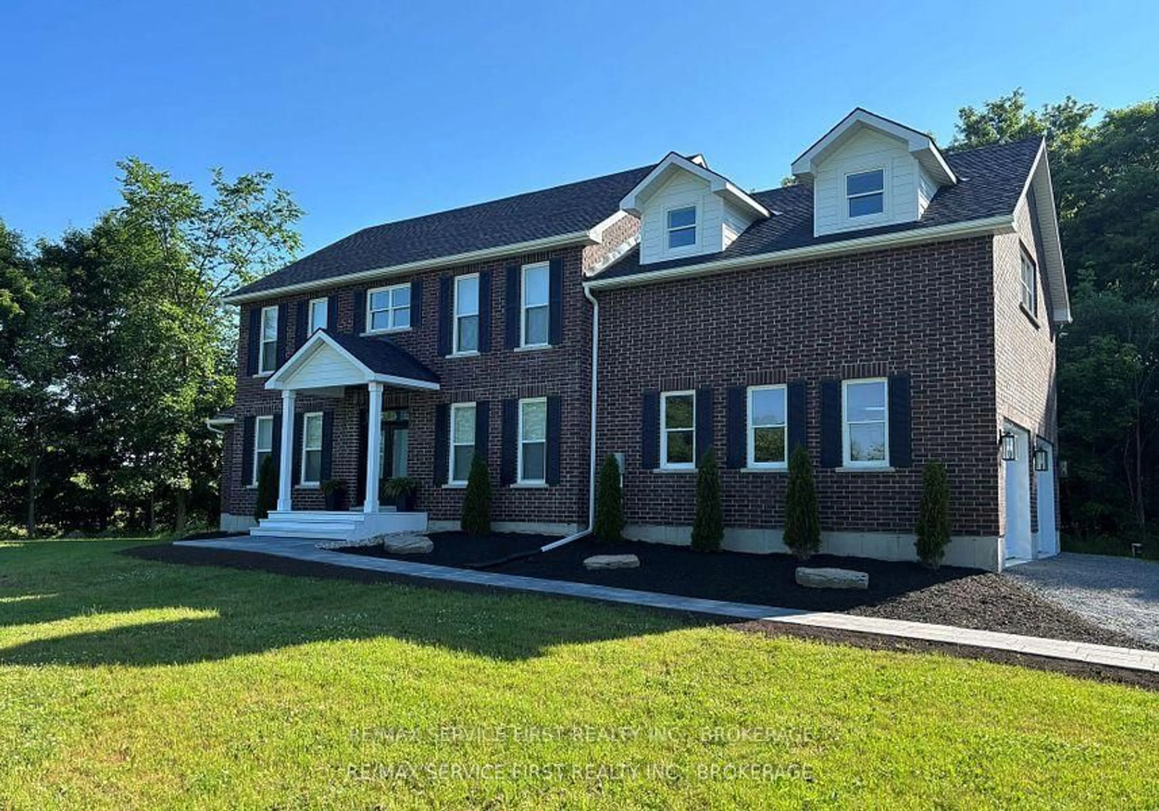 Home with brick exterior material, building for 1012 Applewood Lane, Inverary Ontario K0H 1X0