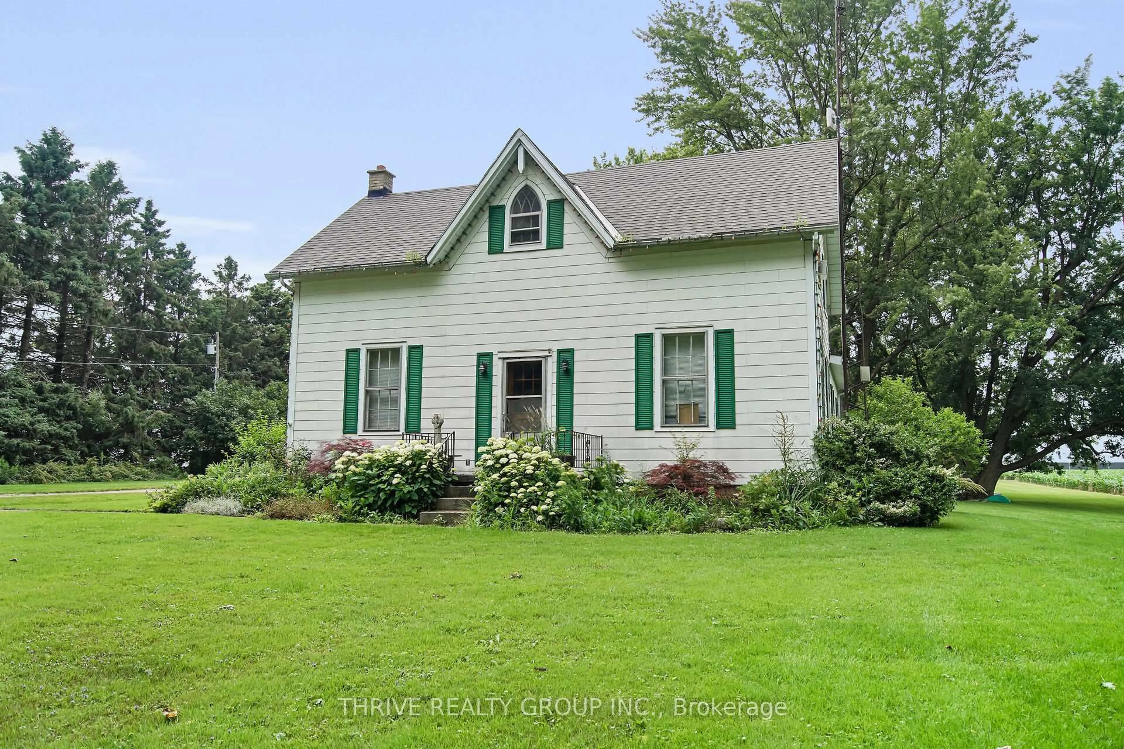 Home with vinyl exterior material, street for 20664 Heritage Rd, Thames Centre Ontario N0M 2P0