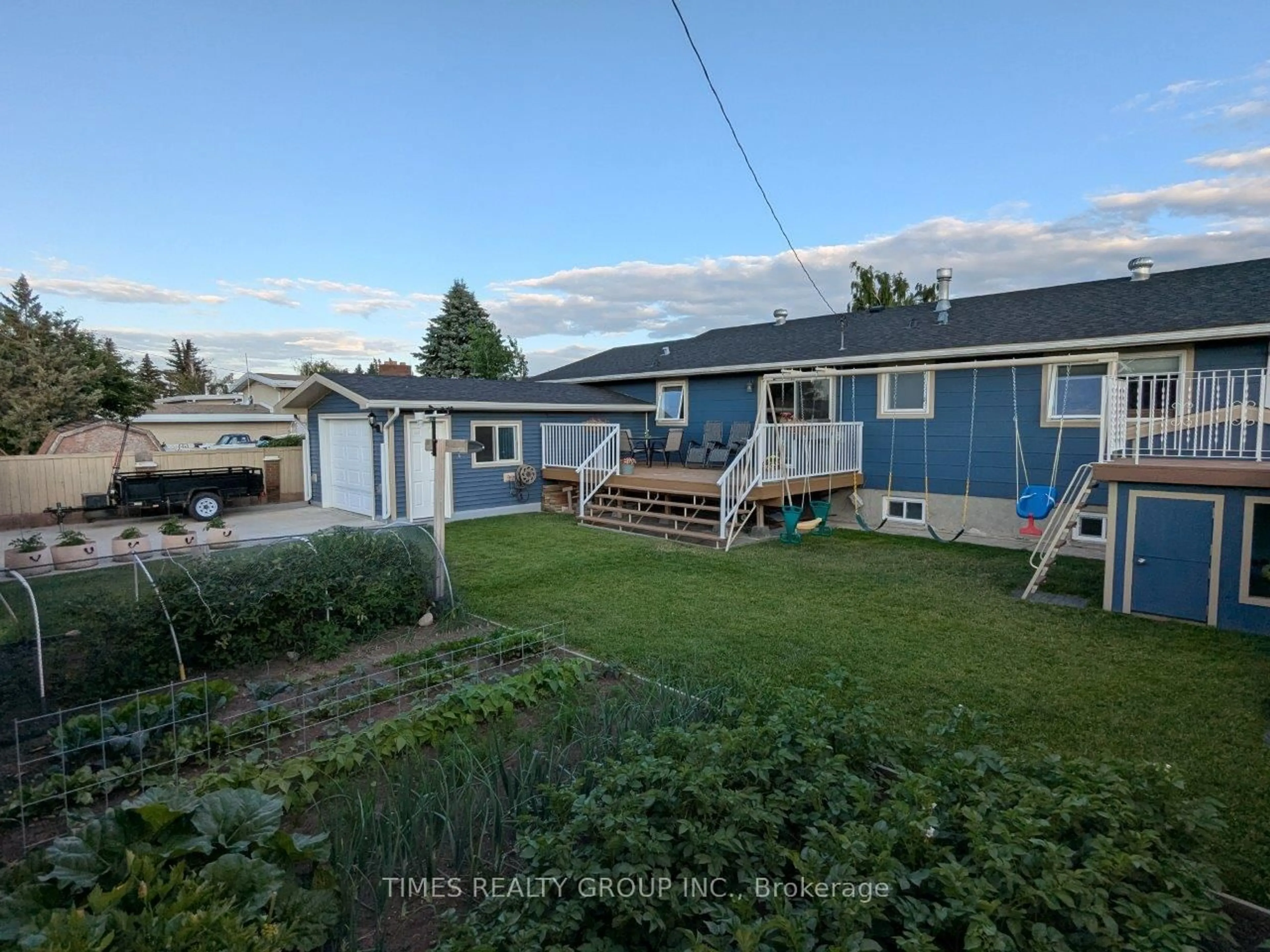 A pic from outside/outdoor area/front of a property/back of a property/a pic from drone, unknown for 621 26th St, Out of Area Alberta T0L 0Z0