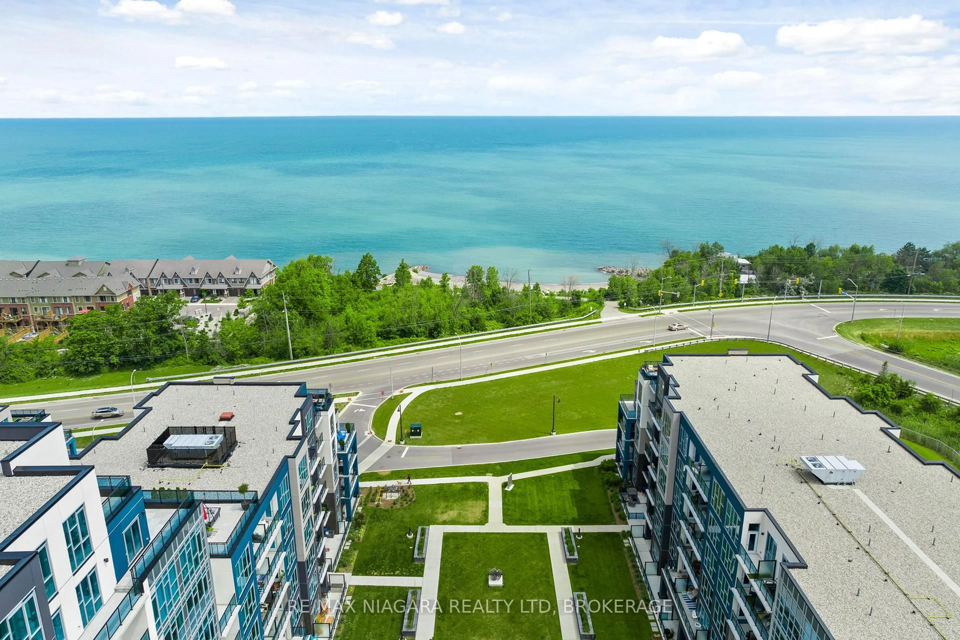 A pic from outside/outdoor area/front of a property/back of a property/a pic from drone, water/lake/river/ocean view for 16 Concord Pl #416, Grimsby Ontario L3M 0J1
